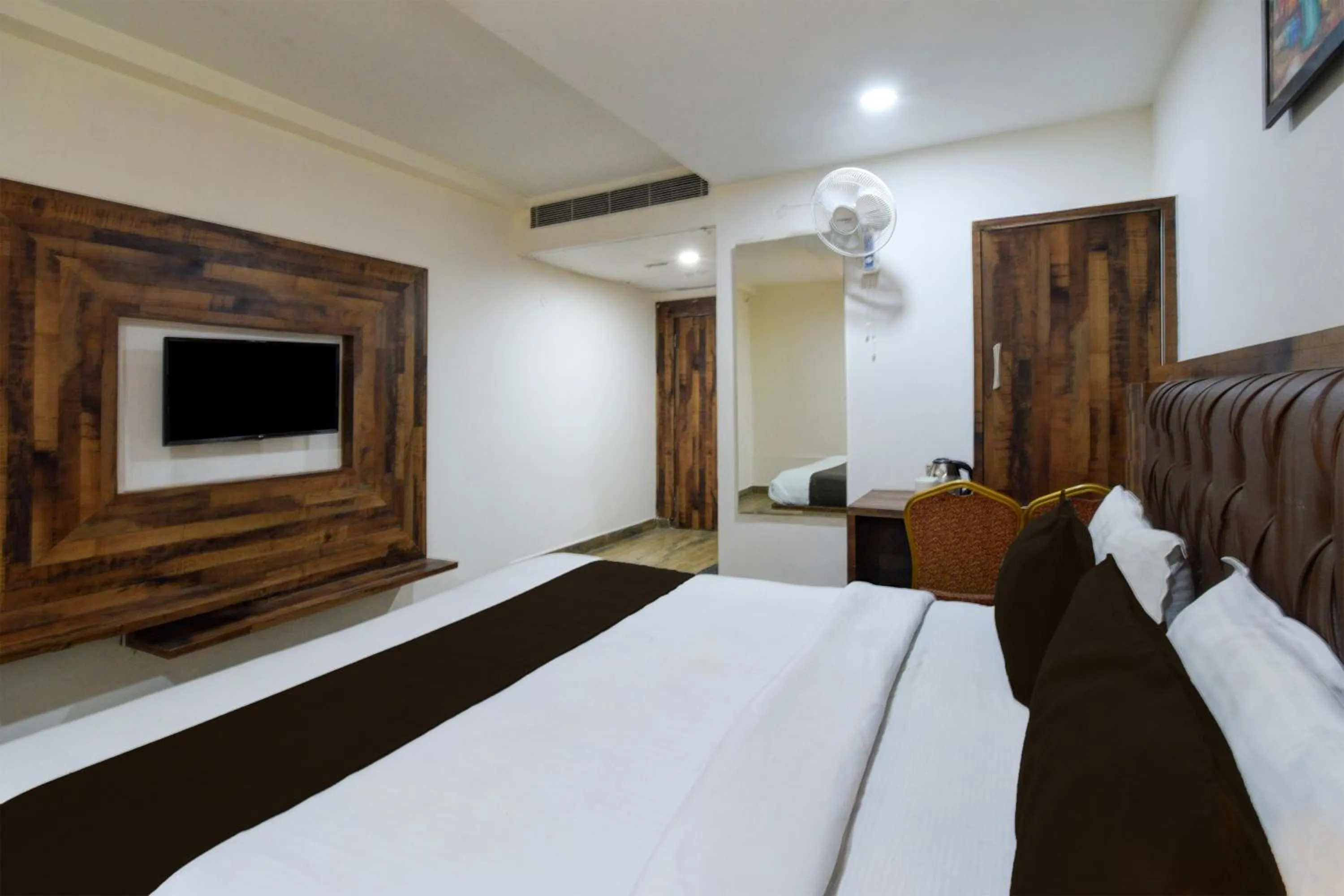 Bedroom, Bed in Super Townhouse Vanasthalipuram Formerly Hotel Surabhi