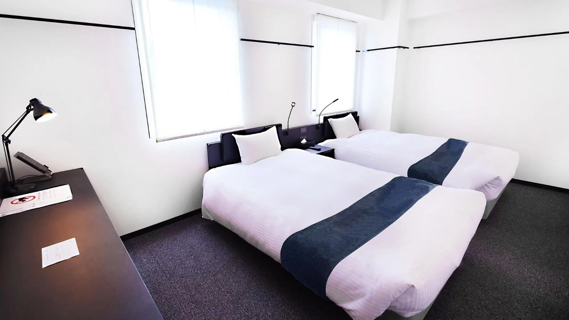 Bed in HOTEL SUI KANDA by ABEST