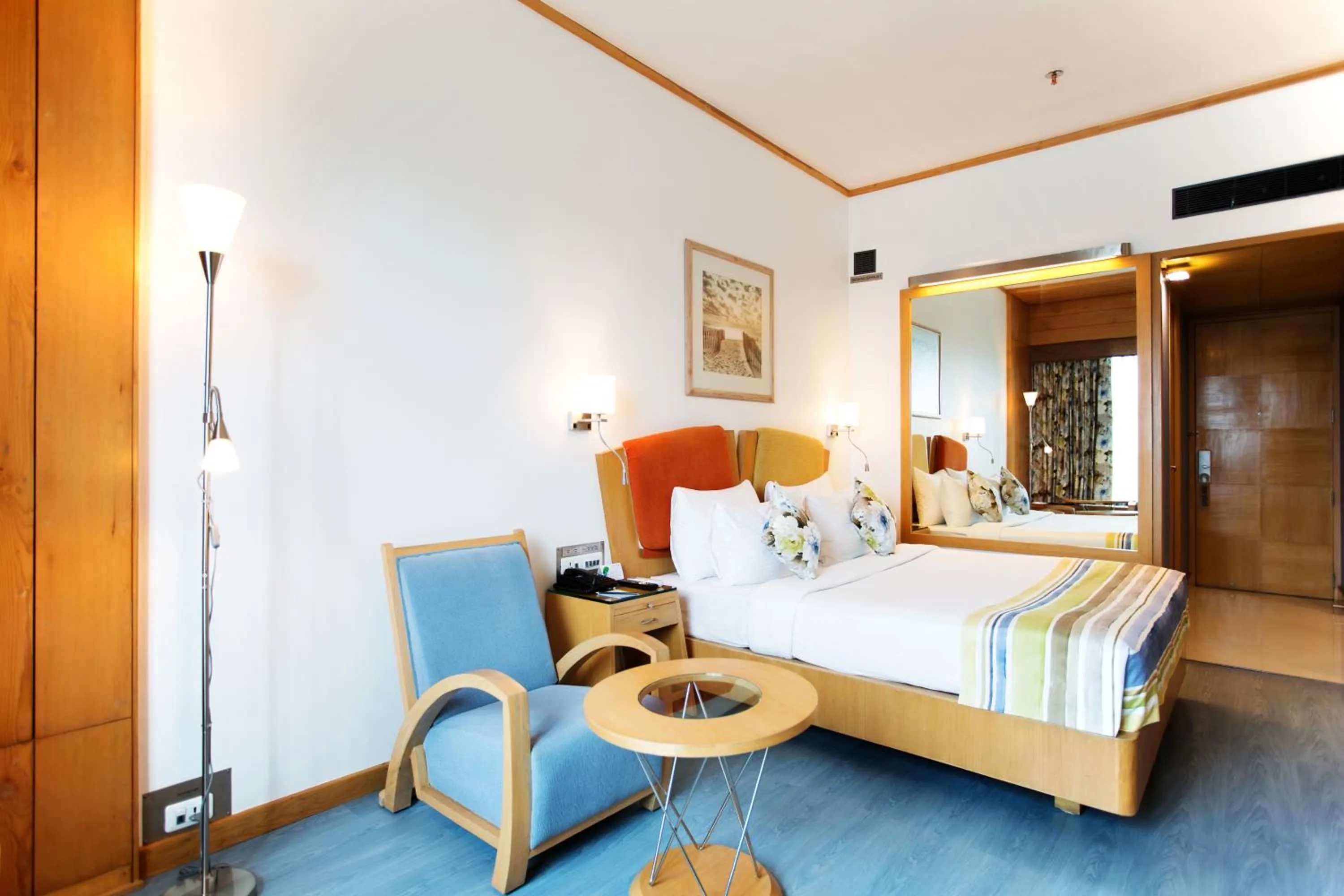 Photo of the whole room, Bed in E-Square The Fern Pune, Series by Marriott