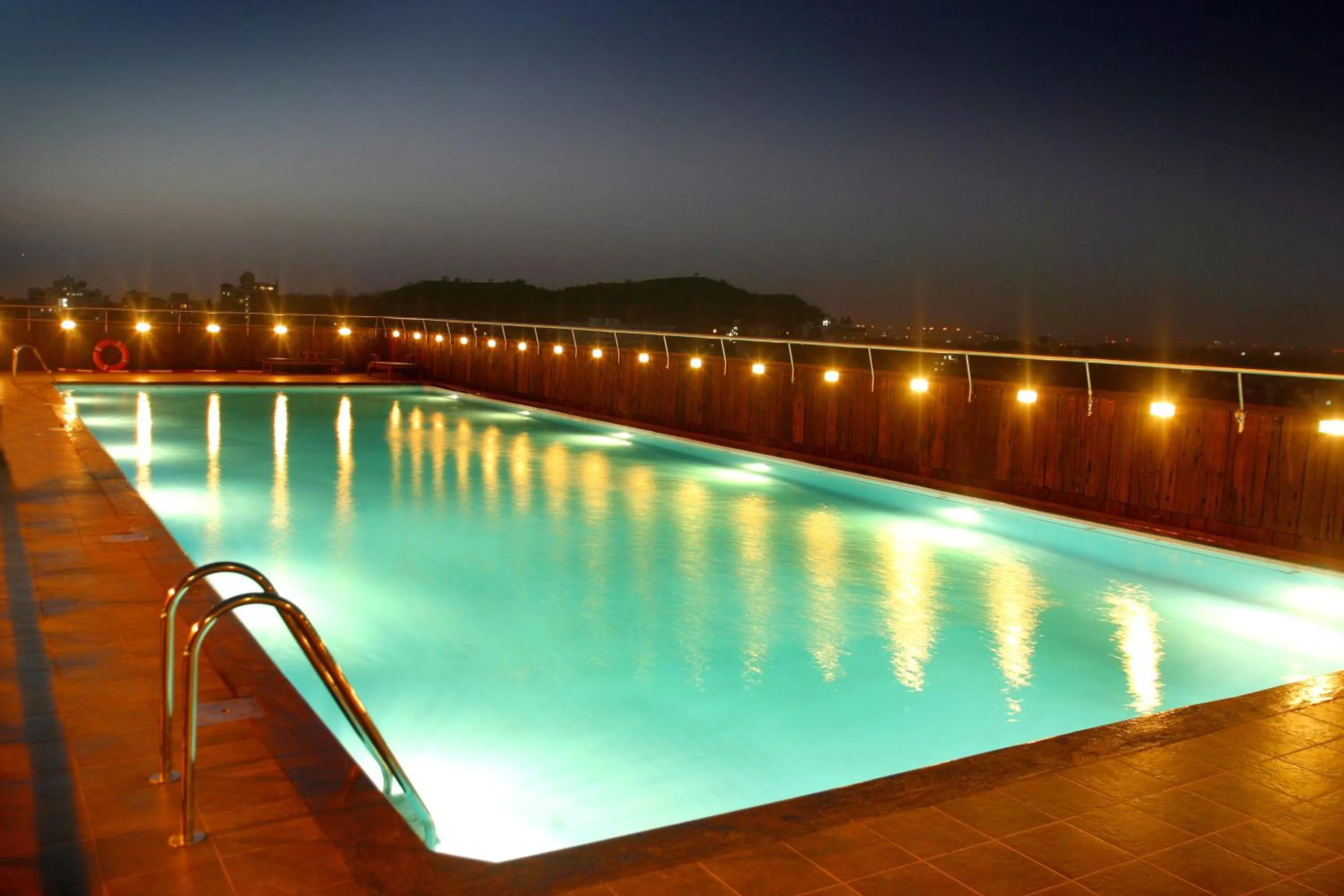 Swimming pool in E-Square The Fern Pune, Series by Marriott