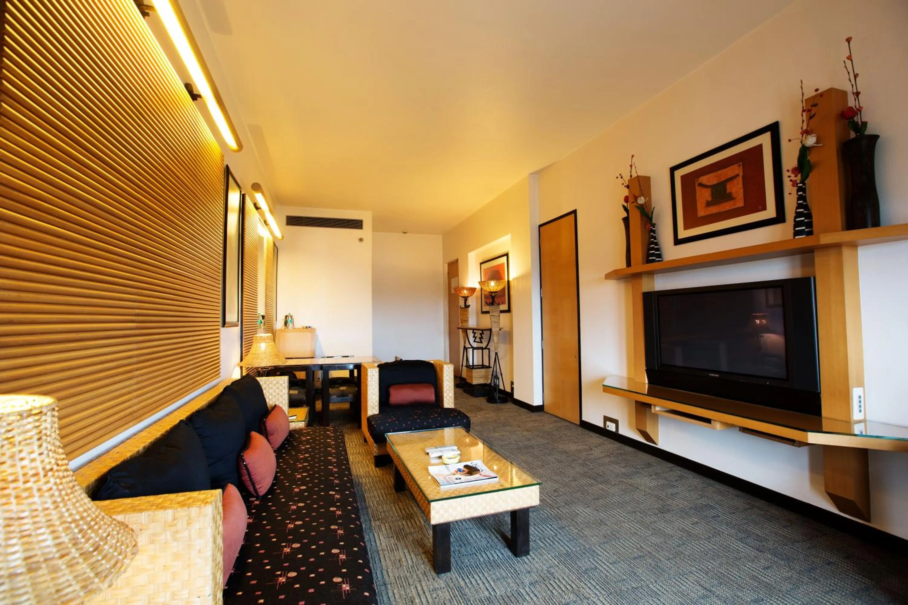 Living room in E-Square The Fern Pune, Series by Marriott