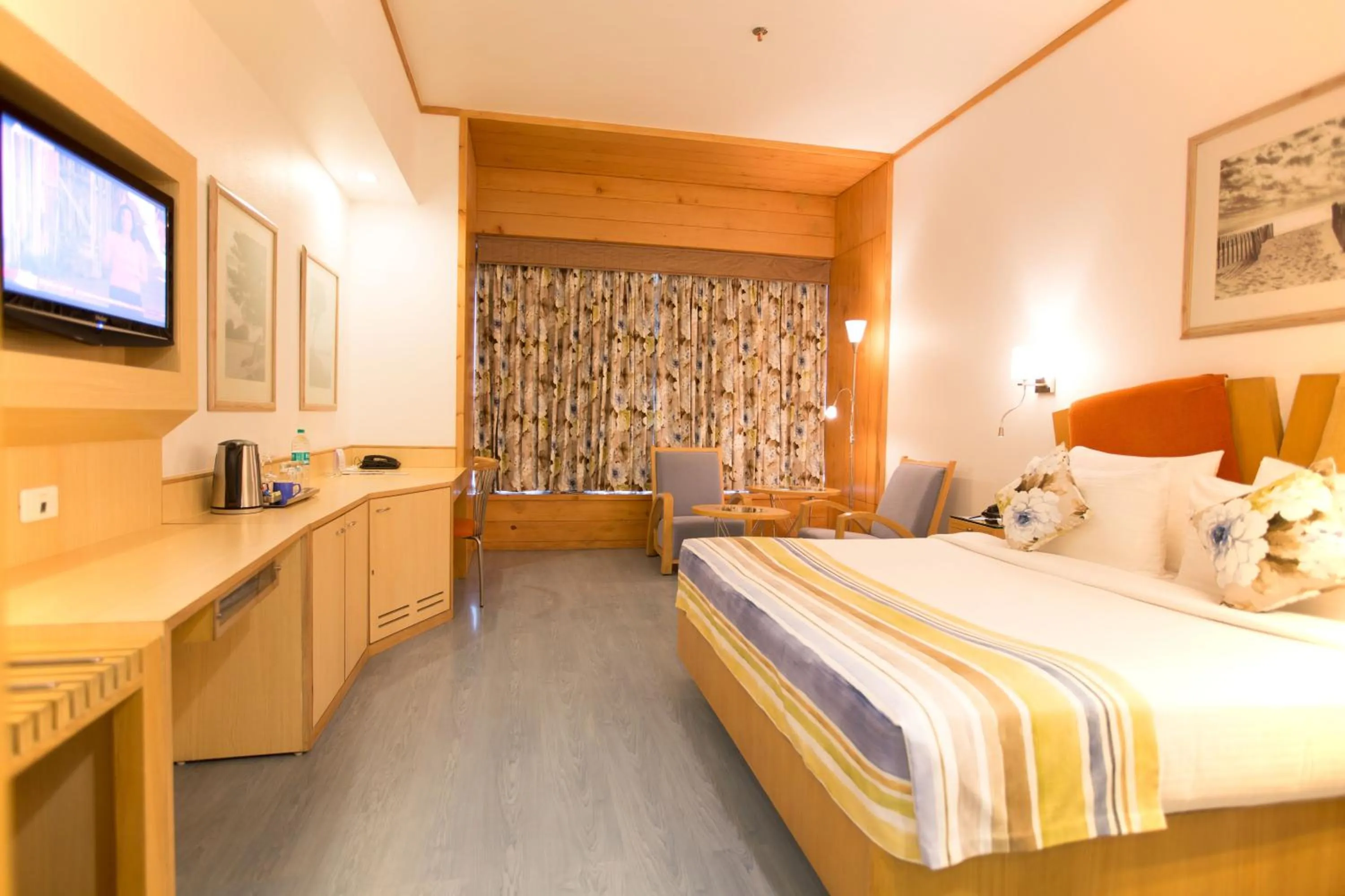 Photo of the whole room, Bed in E-Square The Fern Pune, Series by Marriott