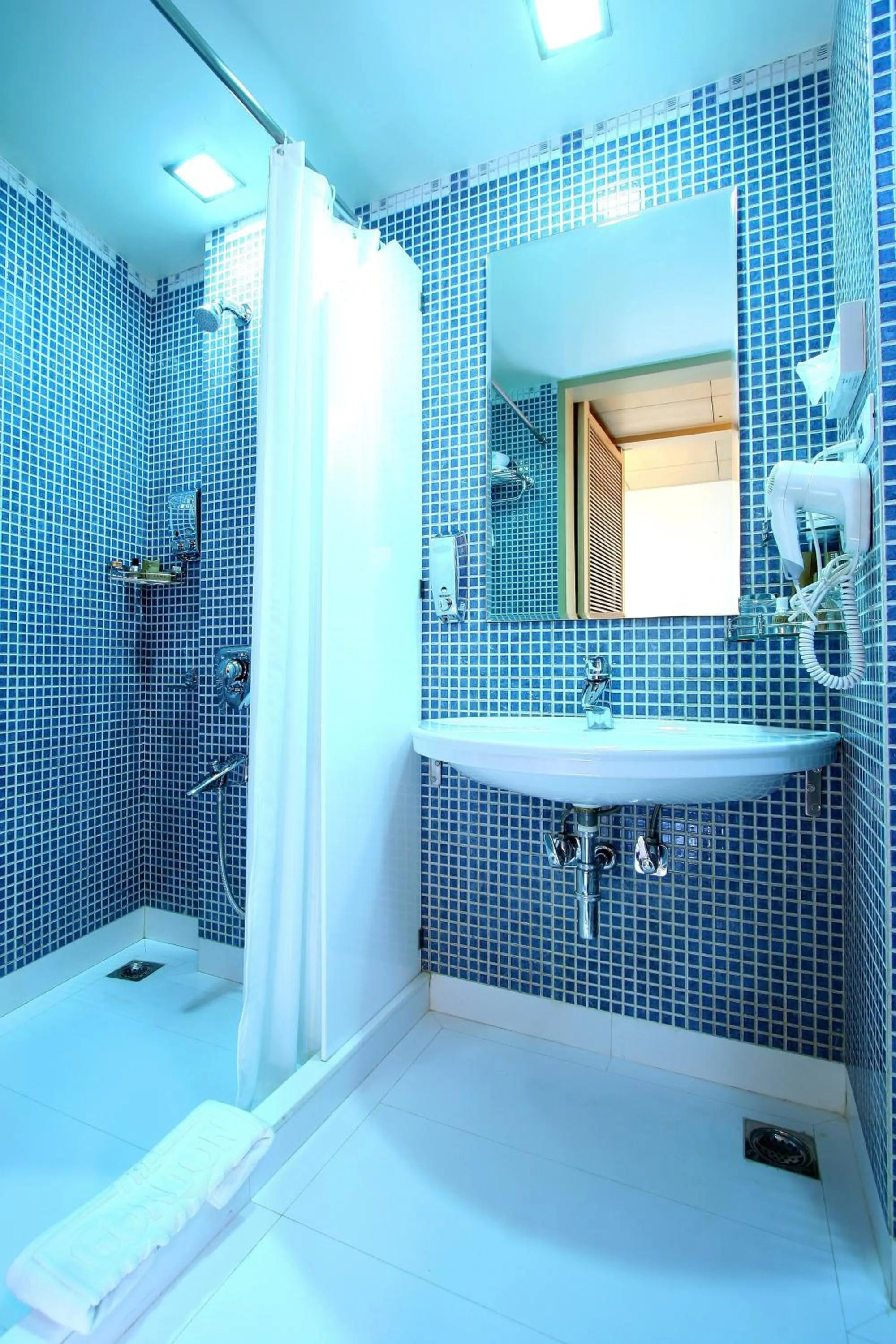 Bathroom in E-Square The Fern Pune, Series by Marriott