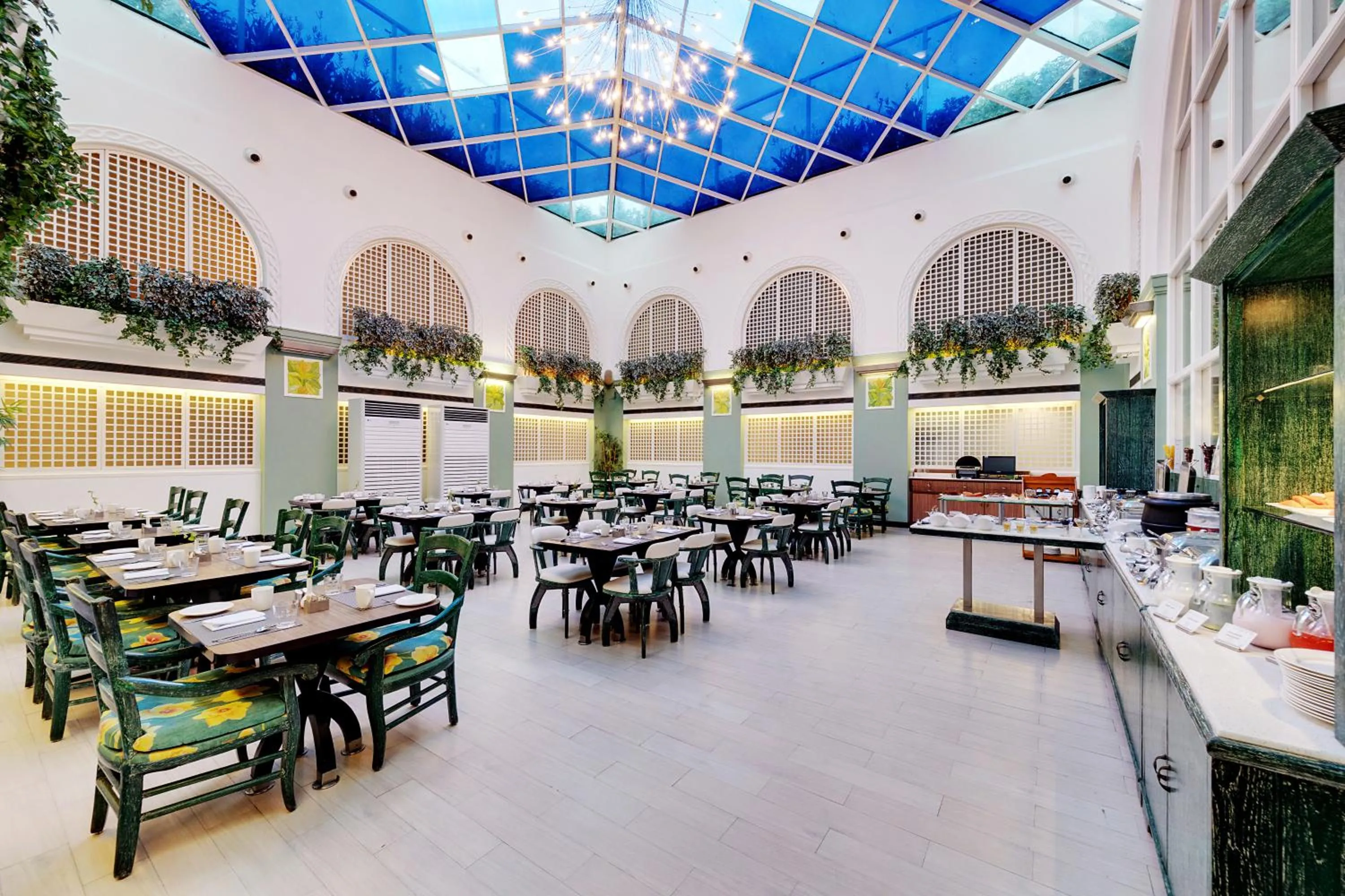 Dining area in E-Square The Fern Pune, Series by Marriott