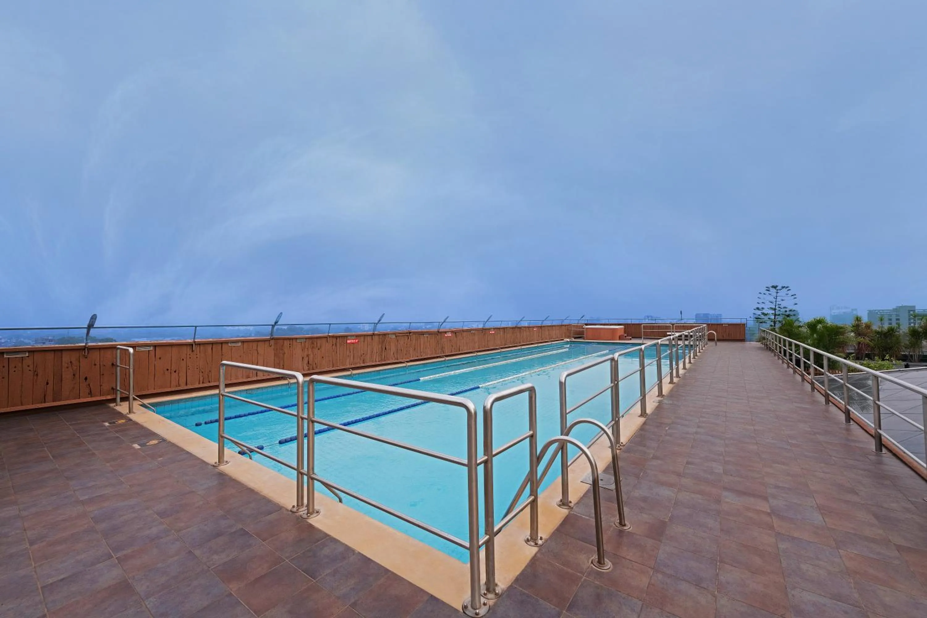 Swimming pool in E-Square The Fern Pune, Series by Marriott