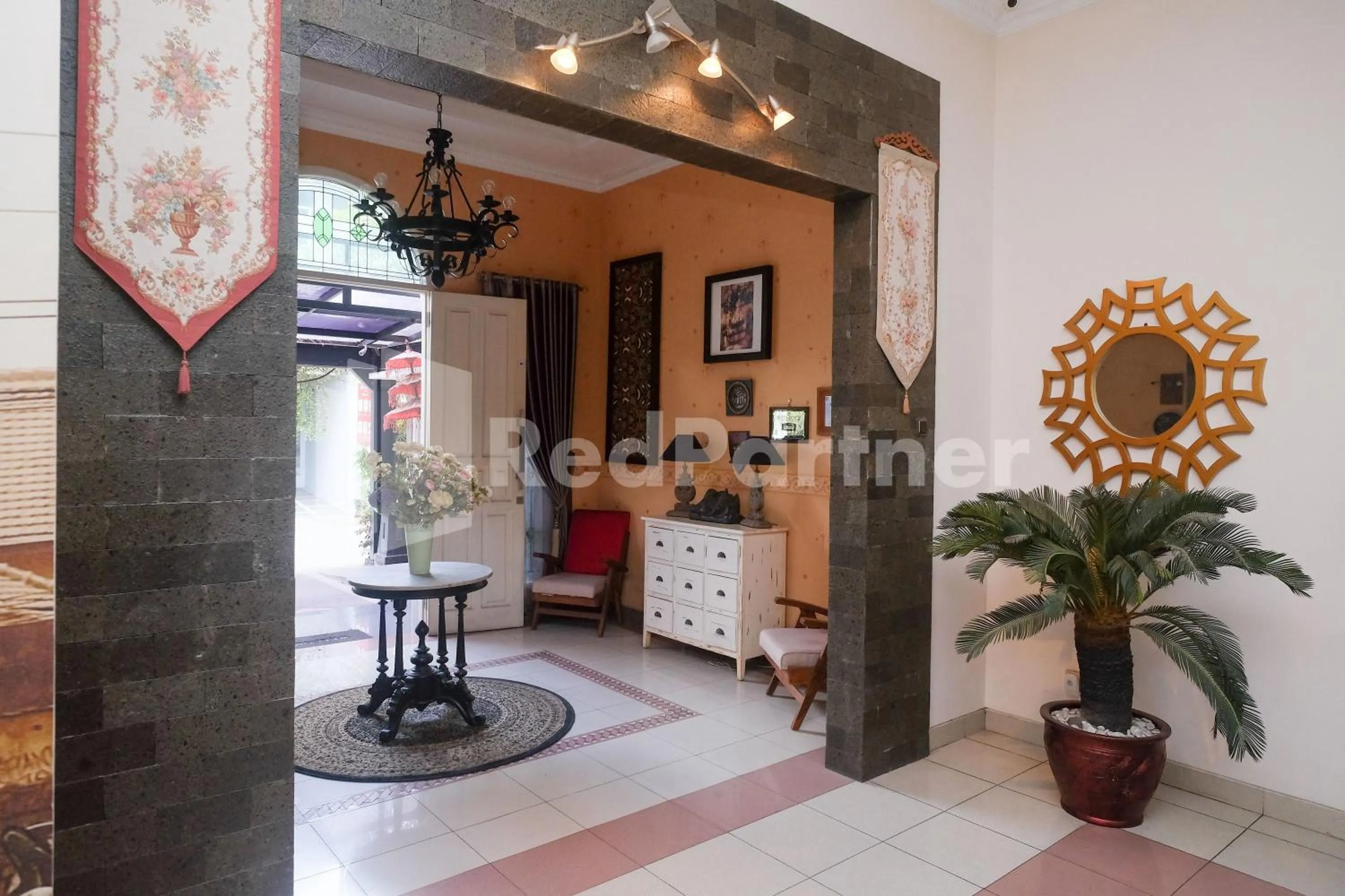 Living room in Just 11 Boutique Syariah Mitra RedDoorz near UGM Yogyakarta