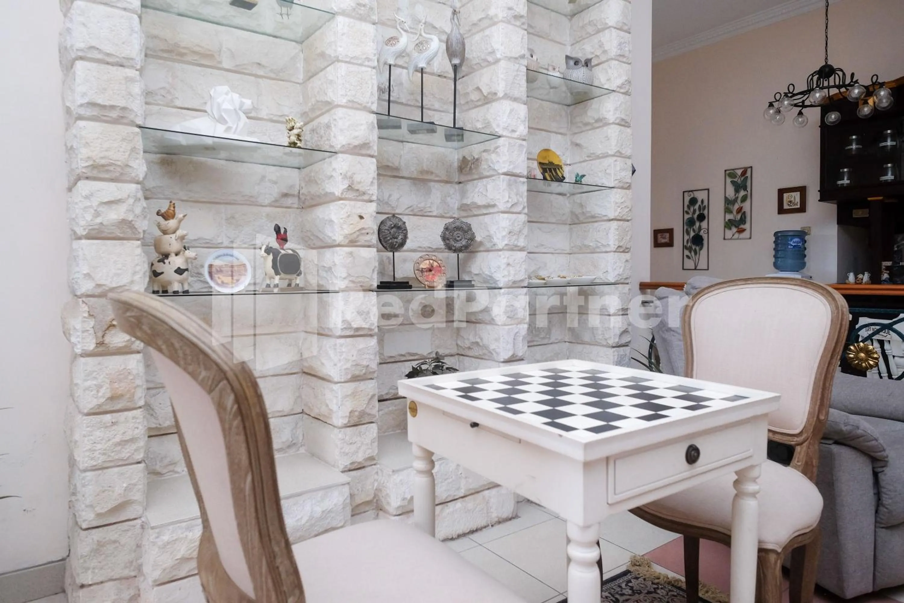 Seating area in Just 11 Boutique Syariah Mitra RedDoorz near UGM Yogyakarta