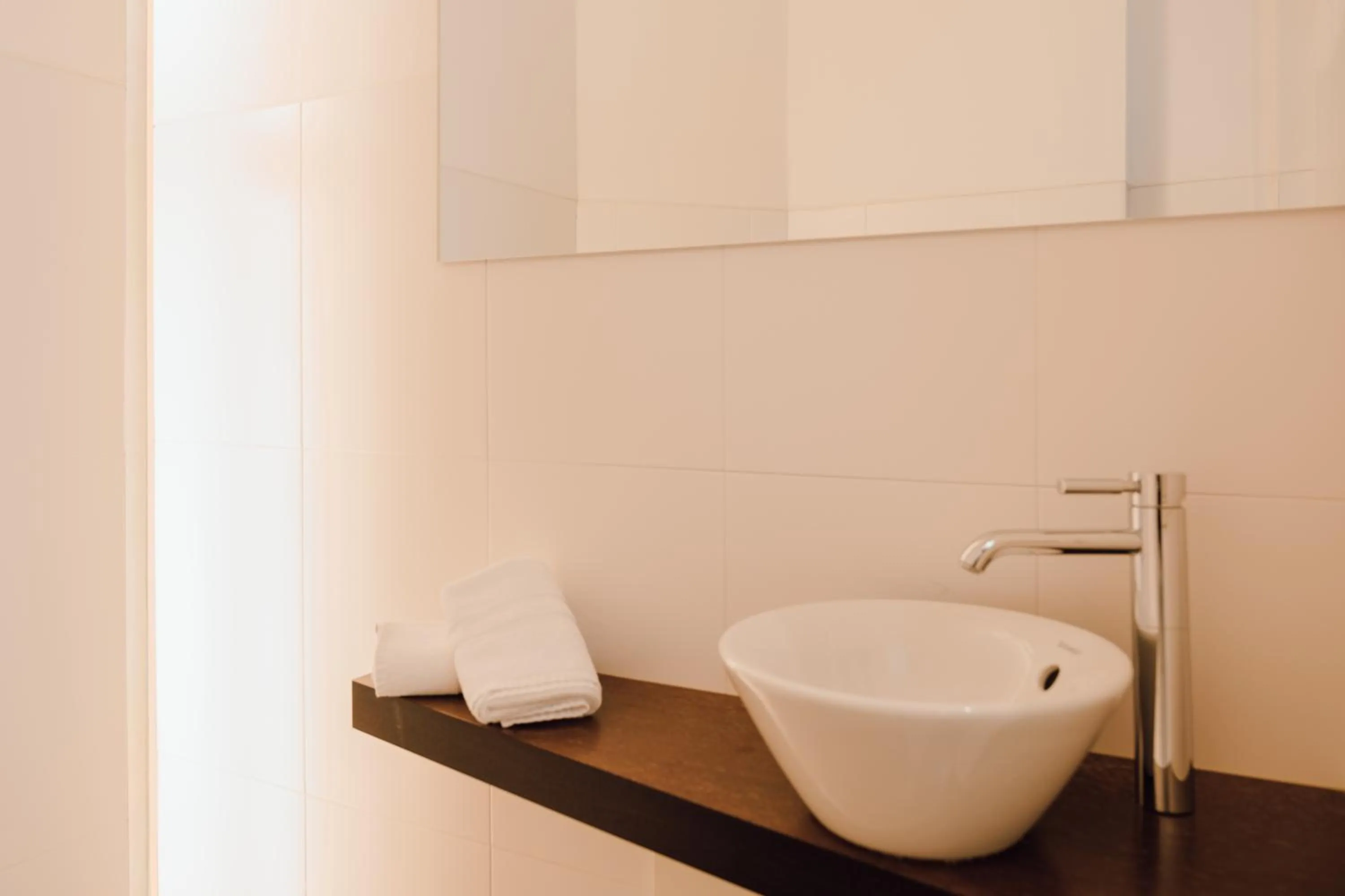 Bathroom in Residence Hotel Alpinum