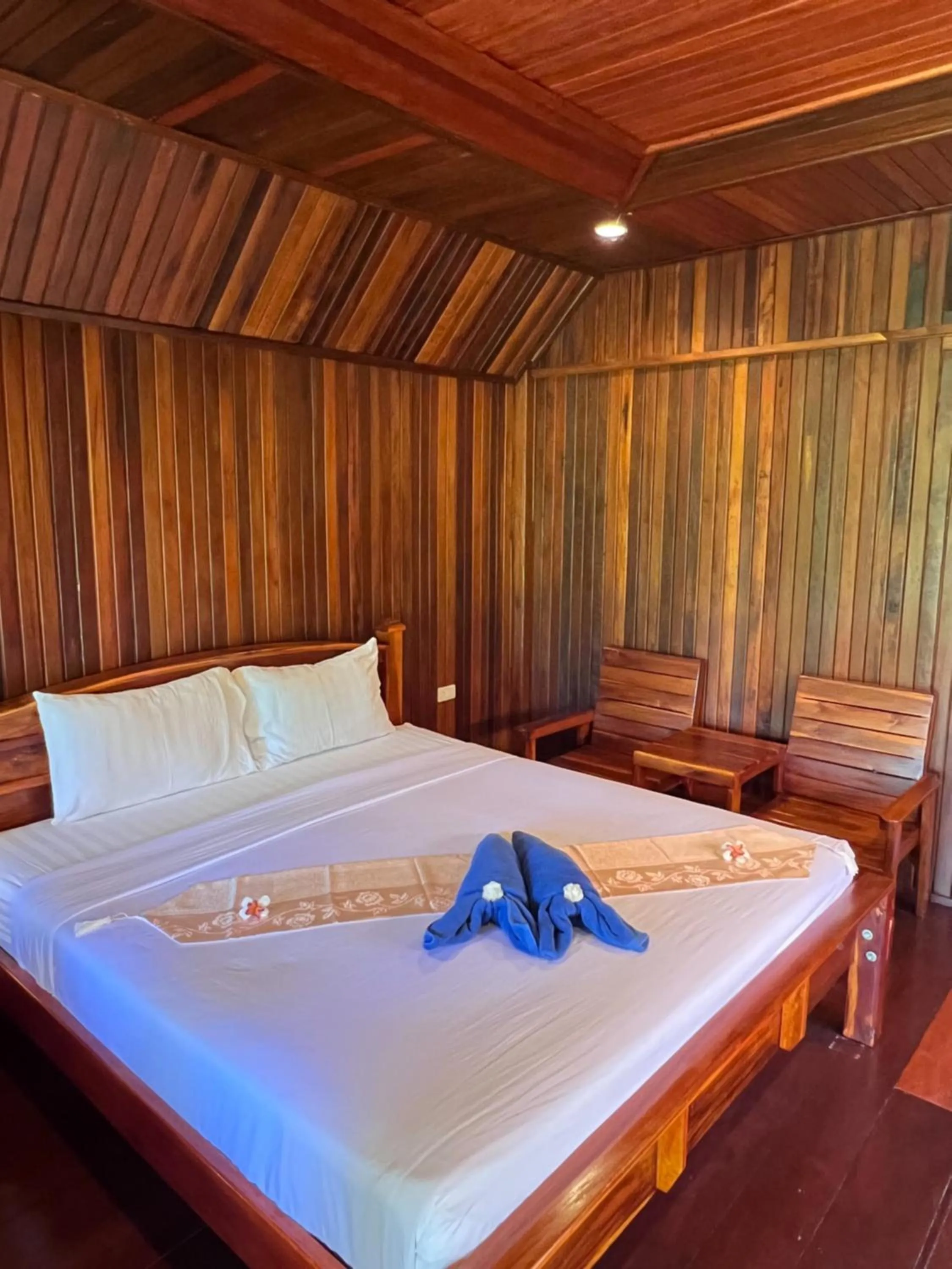 Bed in Diamond Beach Resort