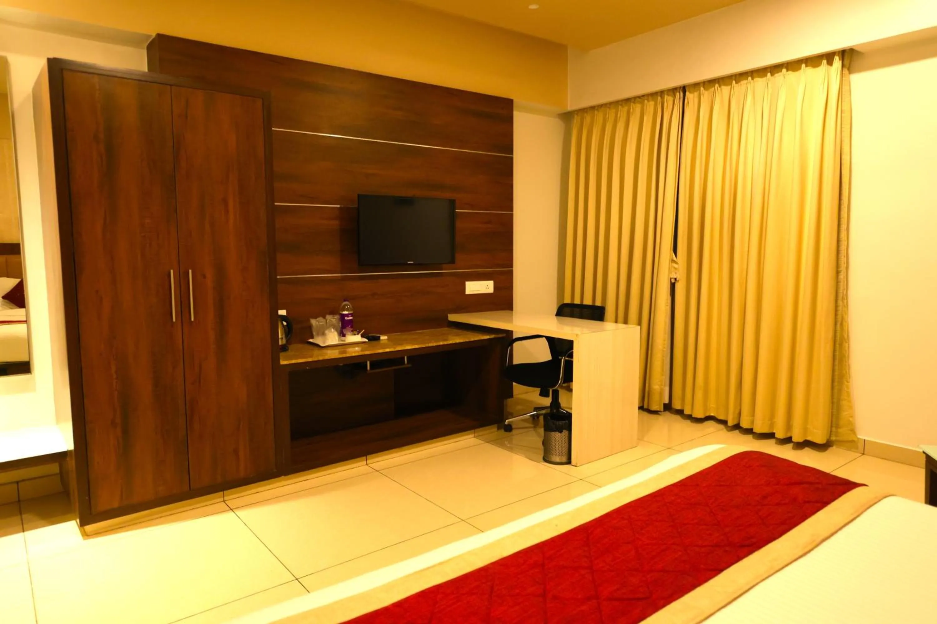 Bed in Sai International Hotel