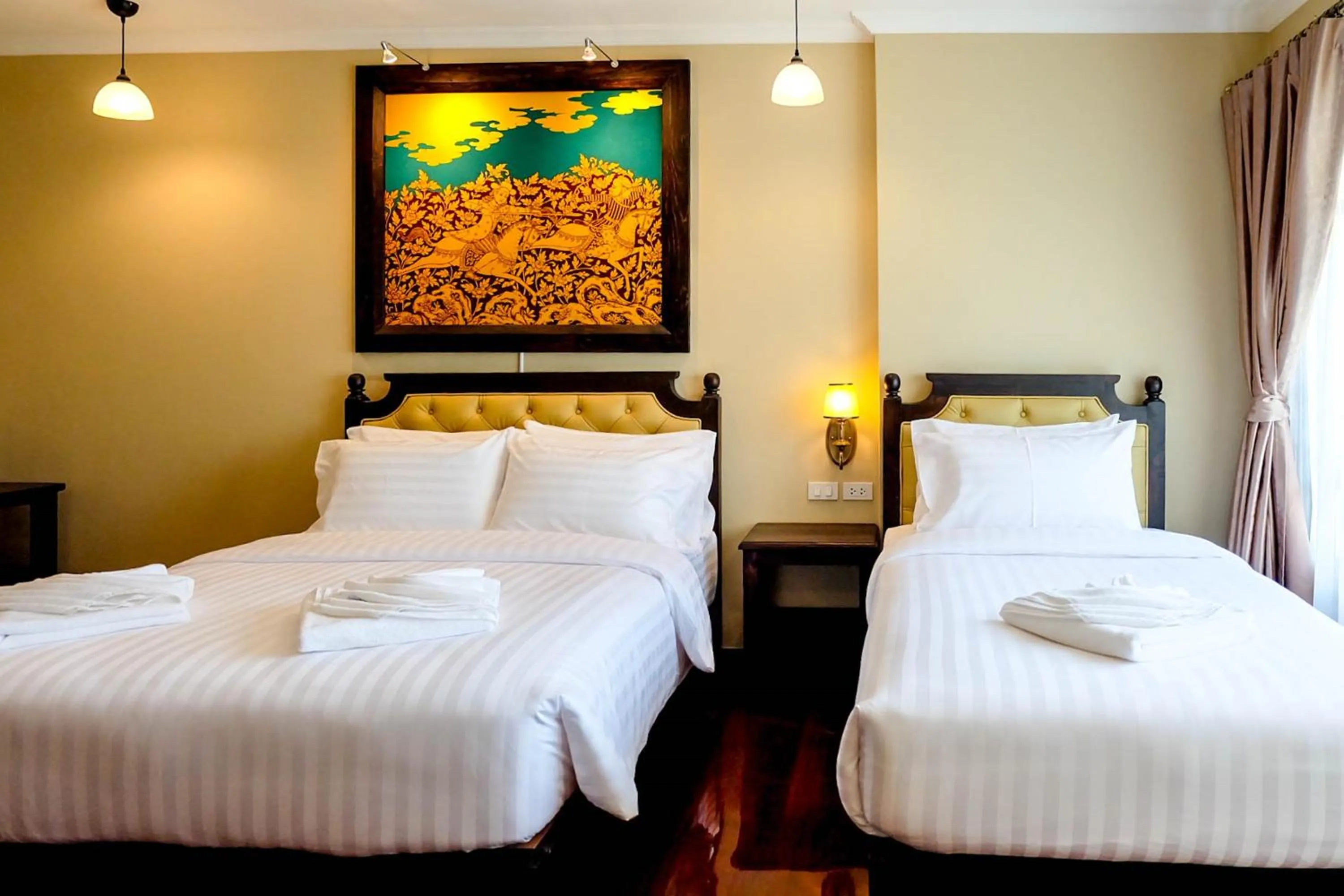 Bed in Siri Heritage Bangkok Hotel