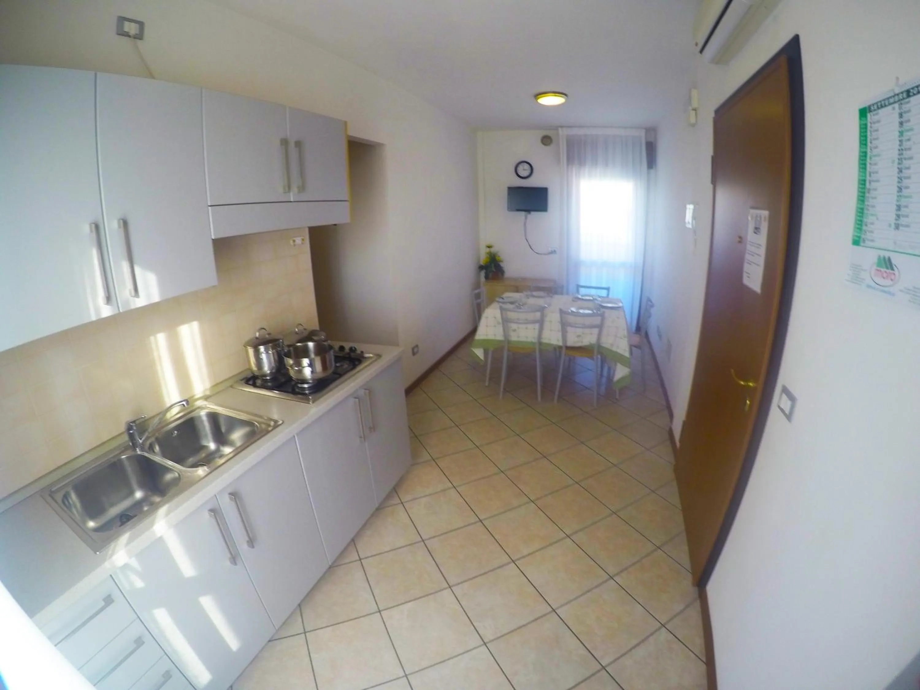 Kitchen or kitchenette in Residence Mediterraneo - Agenzia Cocal