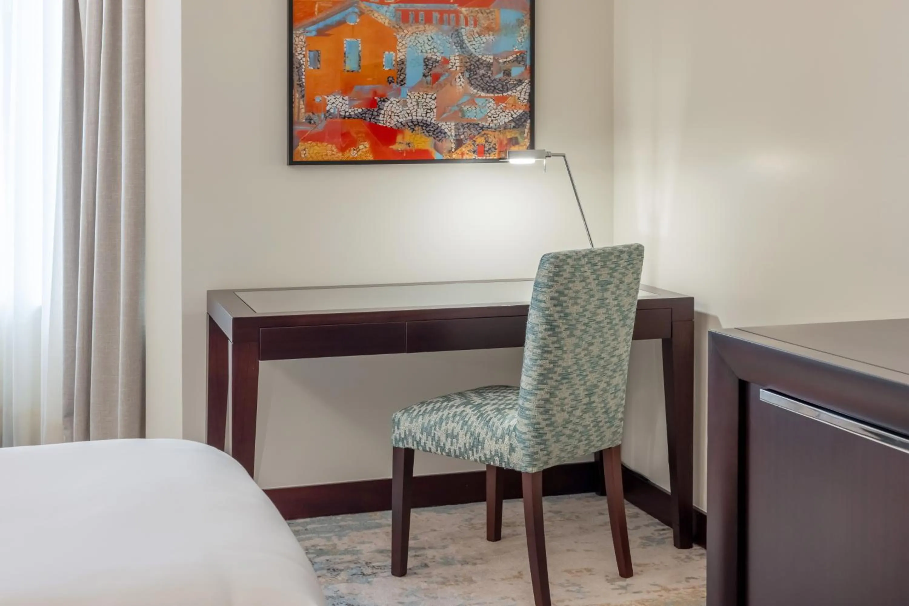 Seating area, Bed in Crowne Plaza Porto by IHG