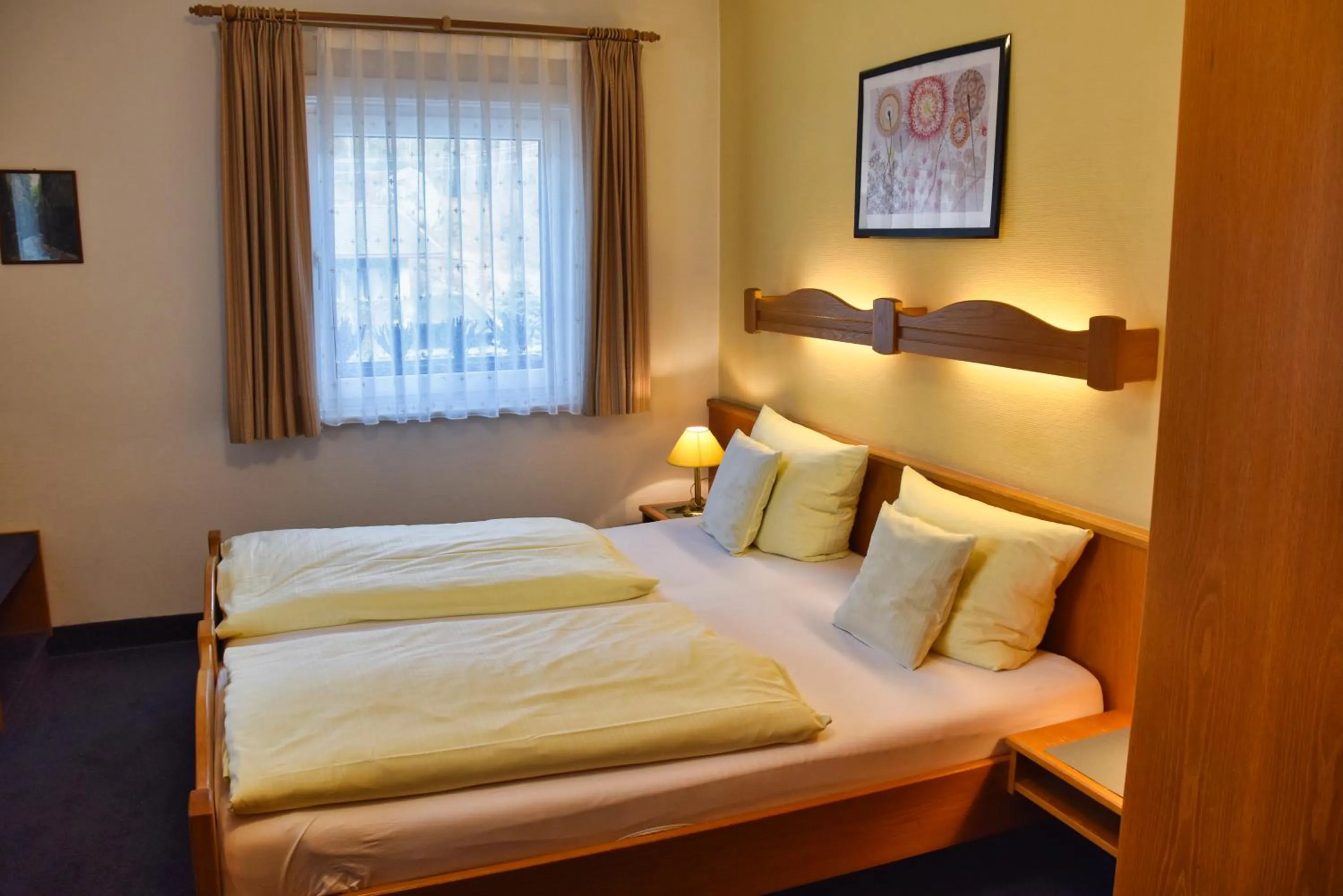 Photo of the whole room, Bed in Zum Franziskaner