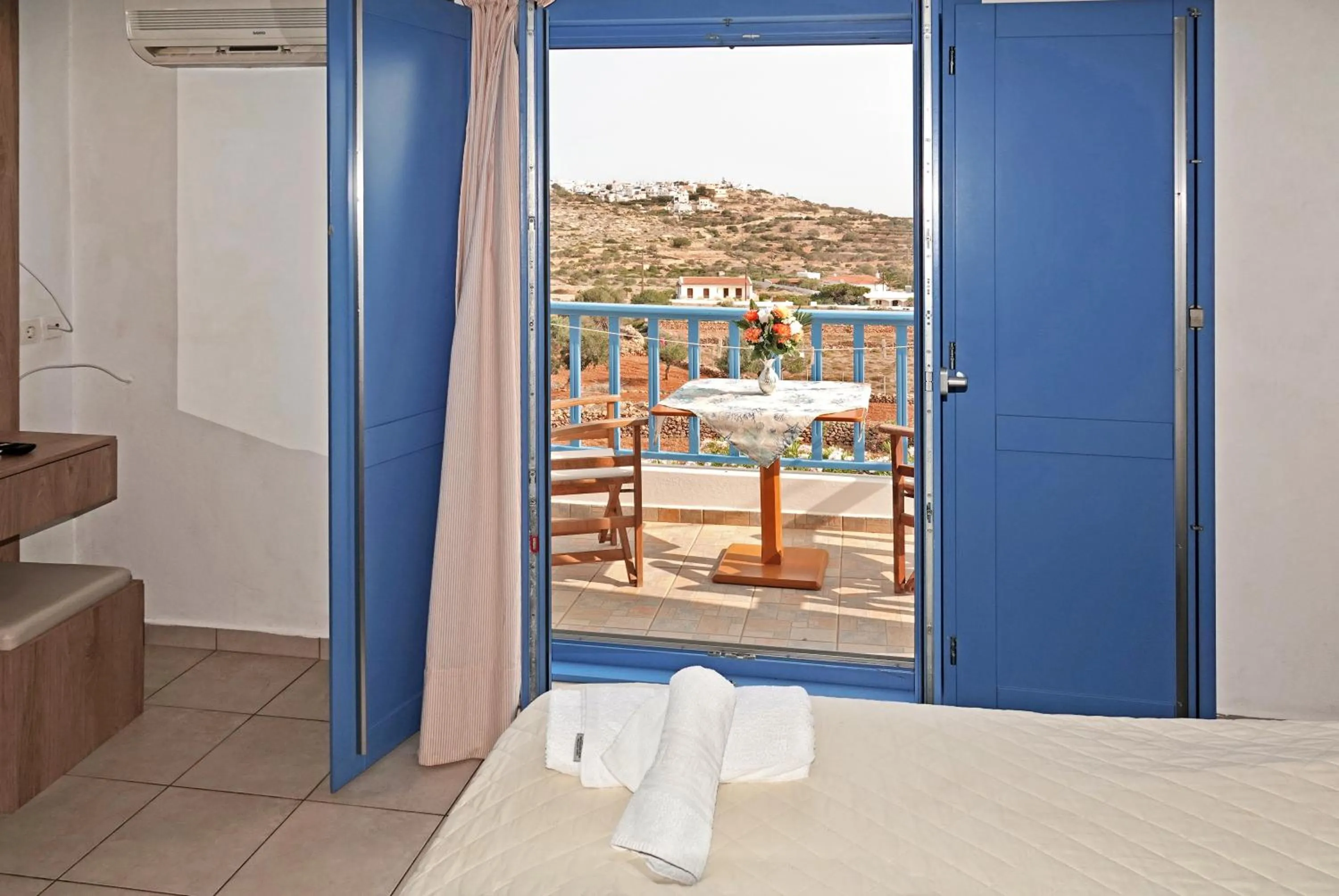 Bed in Aeriko Hotel Apartments