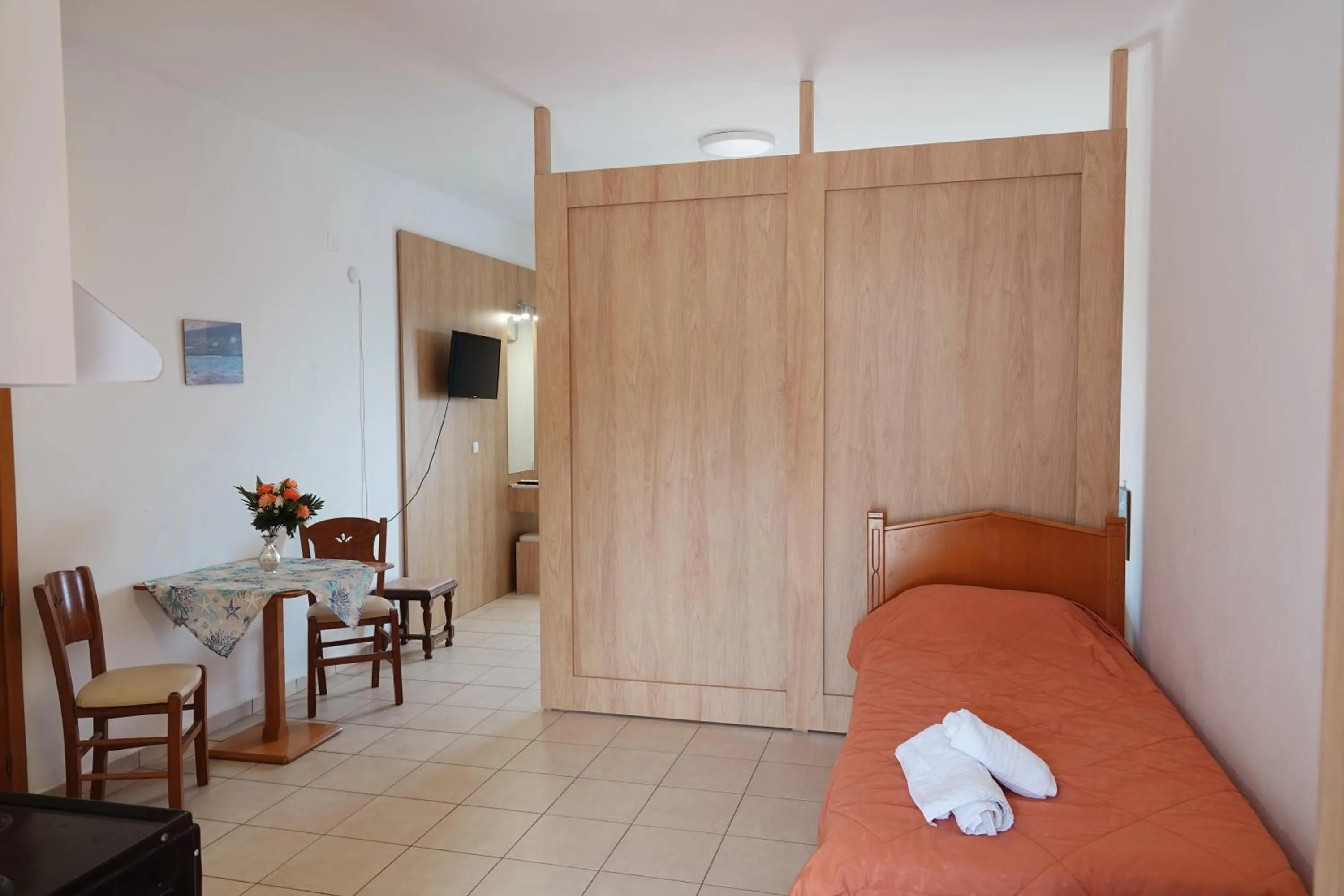 Bed in Aeriko Hotel Apartments