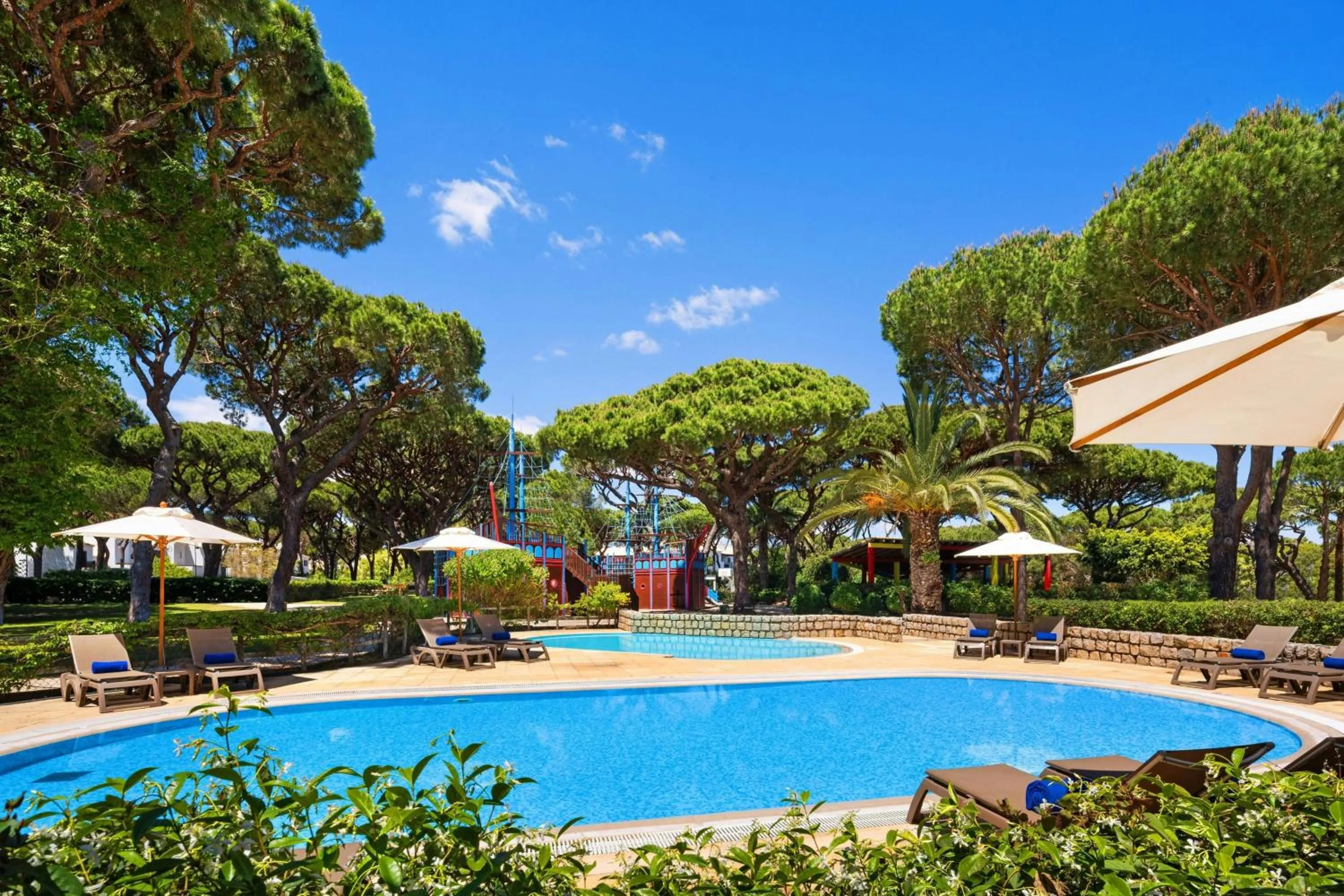 Swimming pool in Pine Cliffs Hotel, a Luxury Collection Resort, Algarve