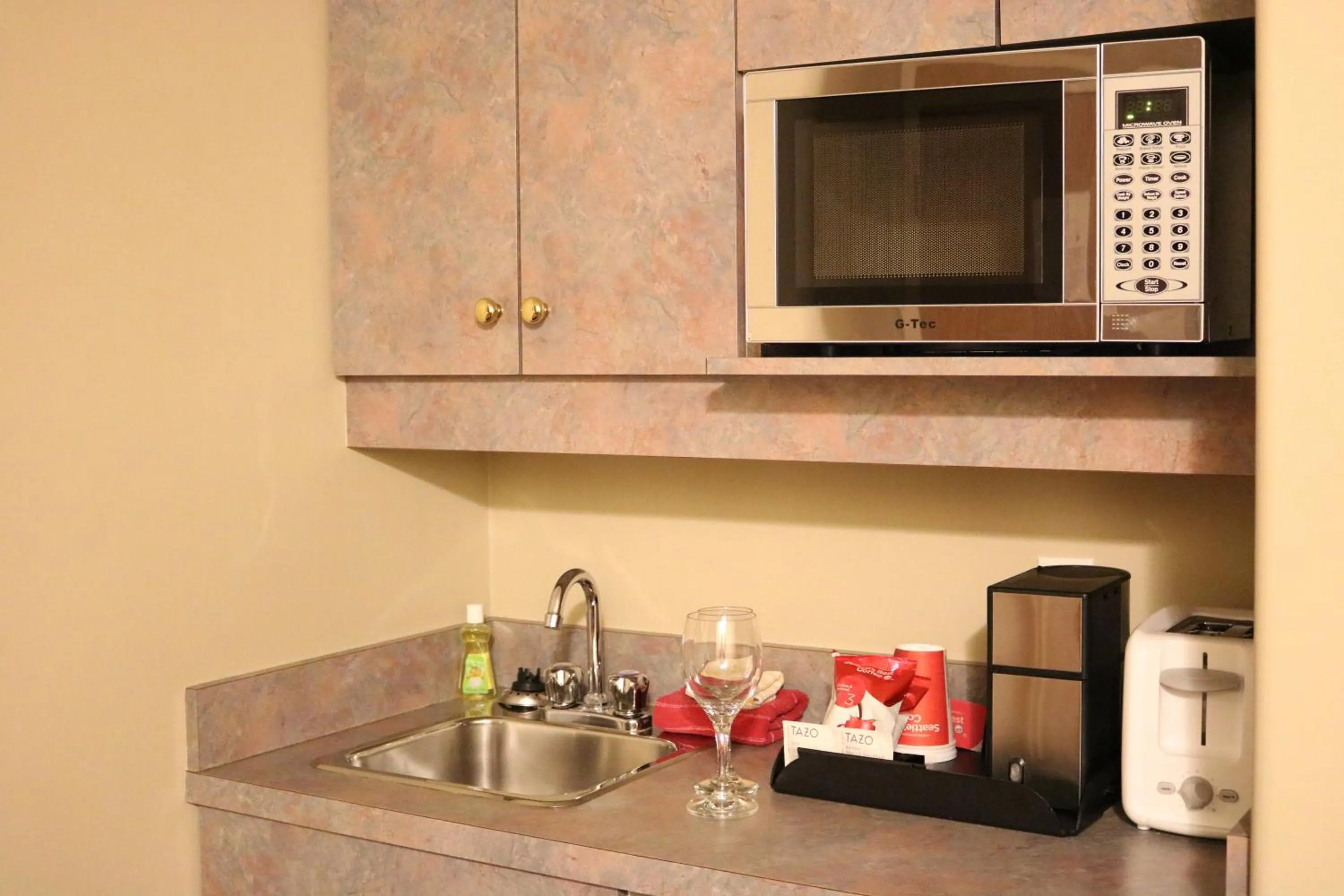 Kitchen or kitchenette in Nomad Hotel & Suites