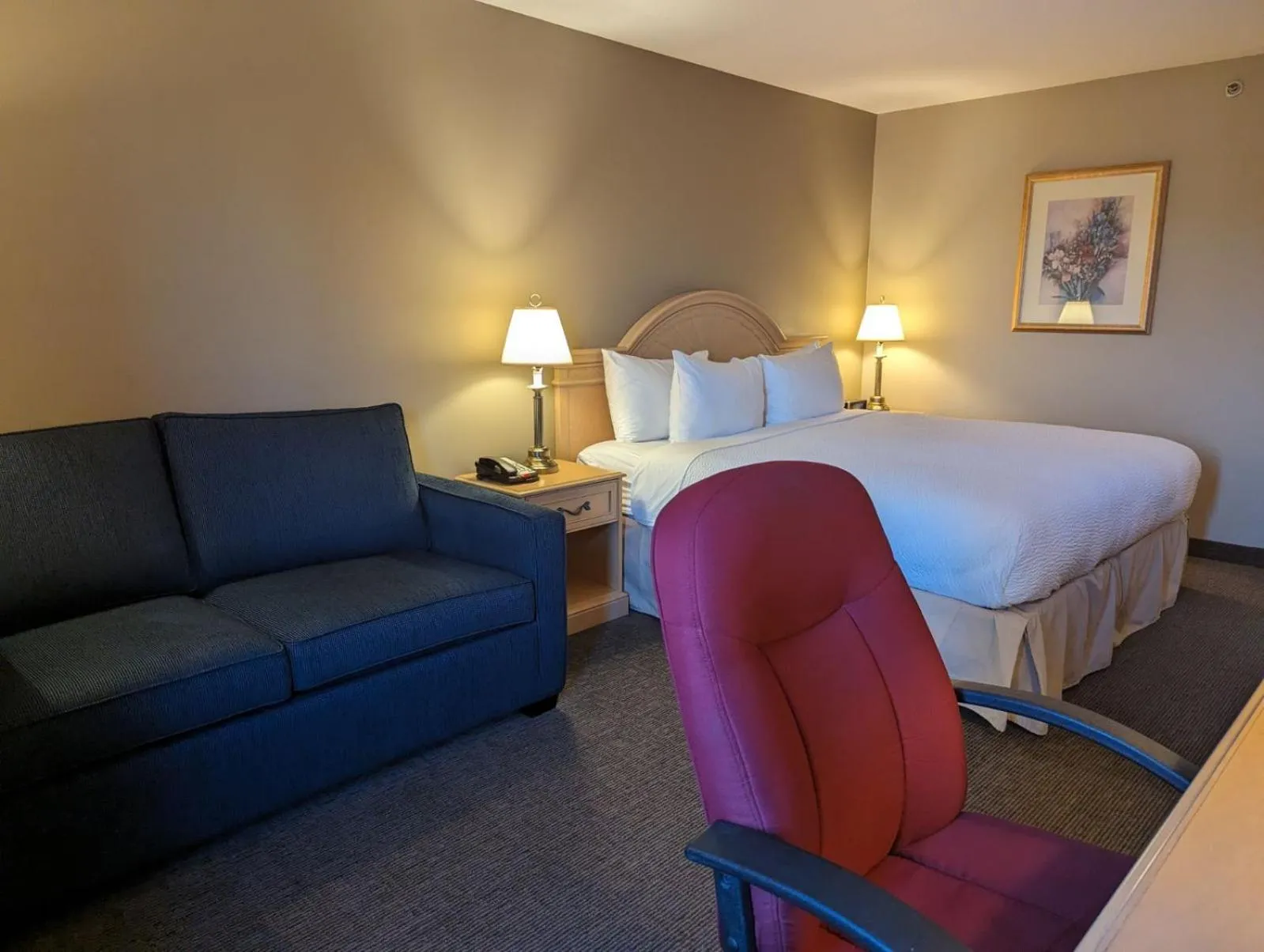 Photo of the whole room, Bed in Nomad Hotel & Suites