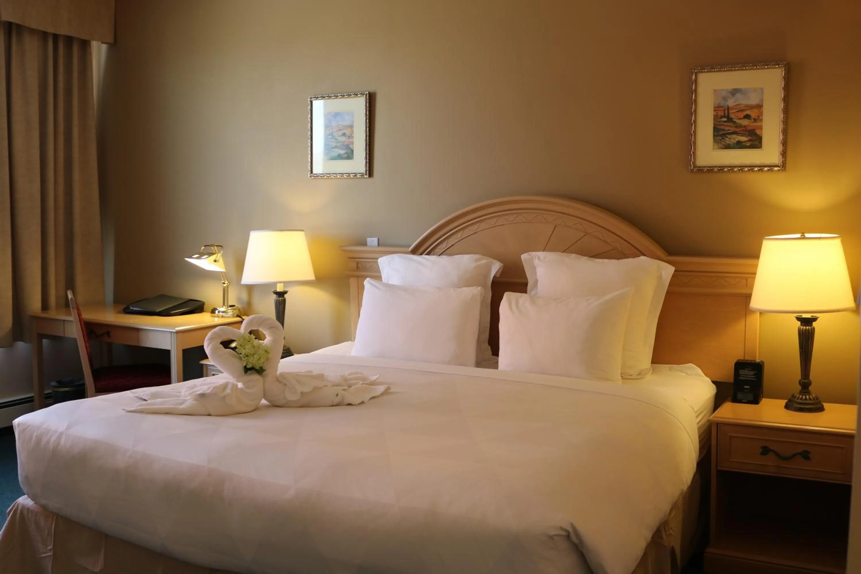 Bed in Nomad Hotel & Suites