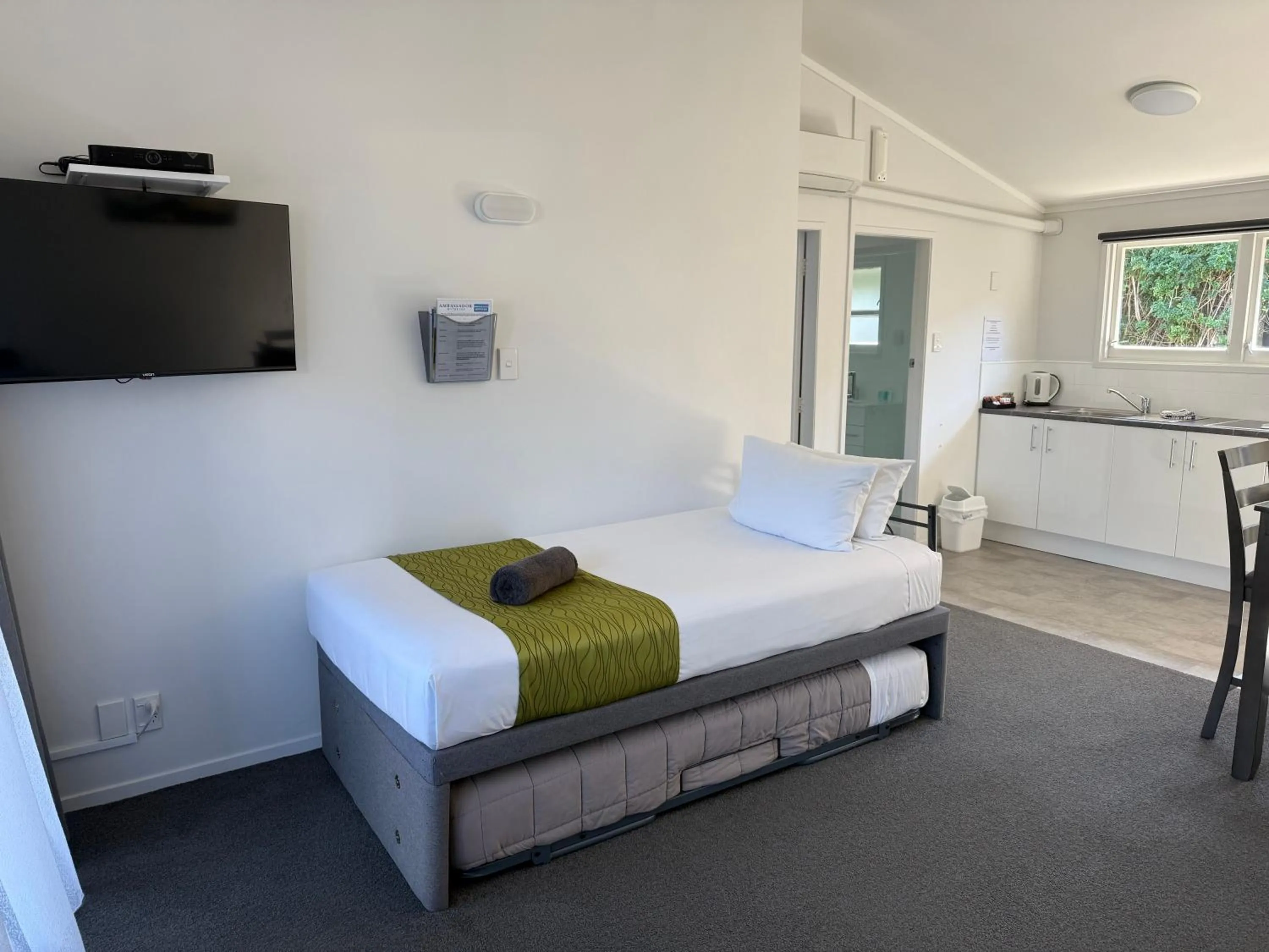 Bed in Ambassador Motor Inn