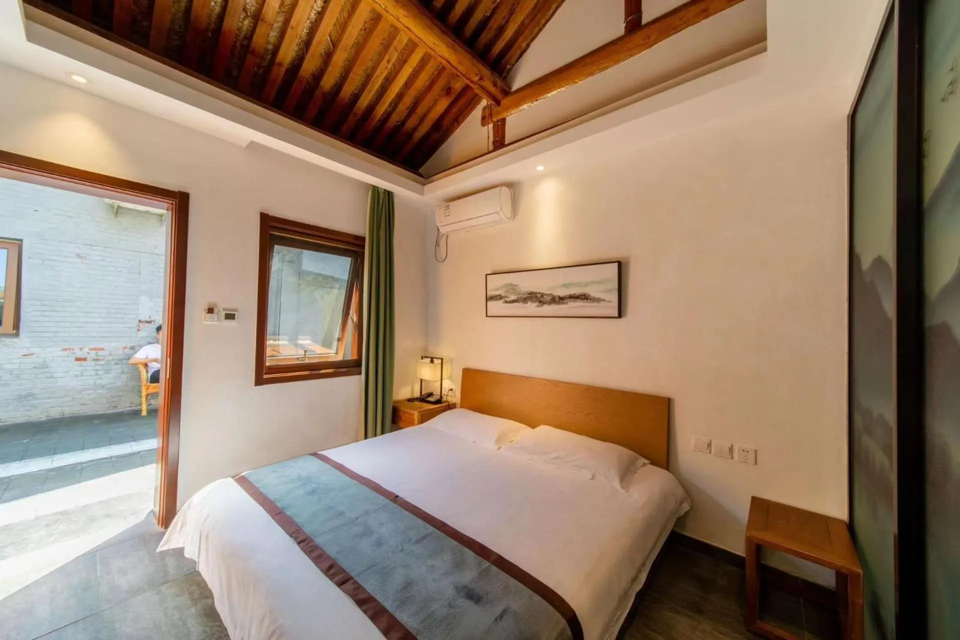 Bed in Guipu Beihai Courtyard Hotel Beijing