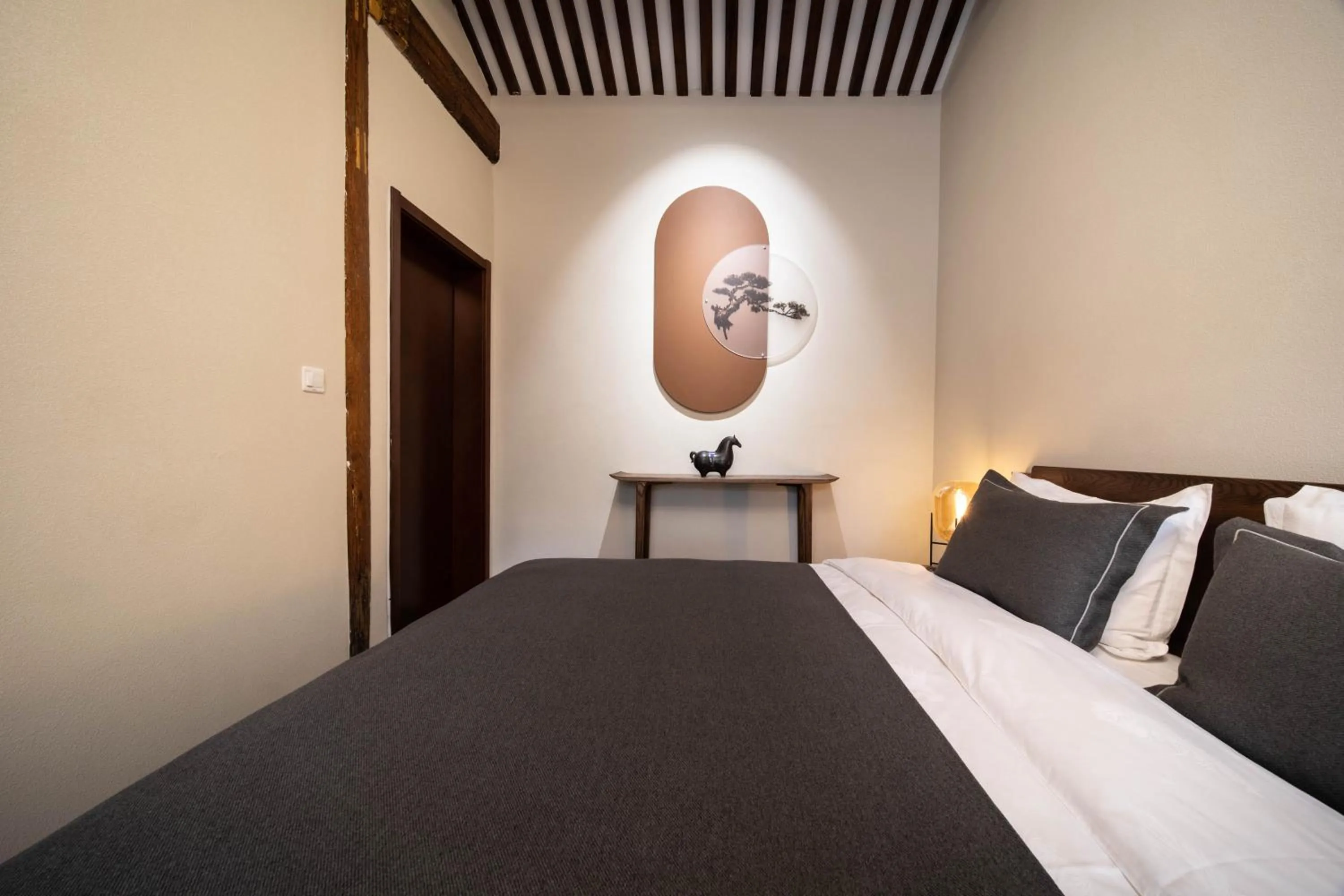 Bed in Guipu Beihai Courtyard Hotel Beijing