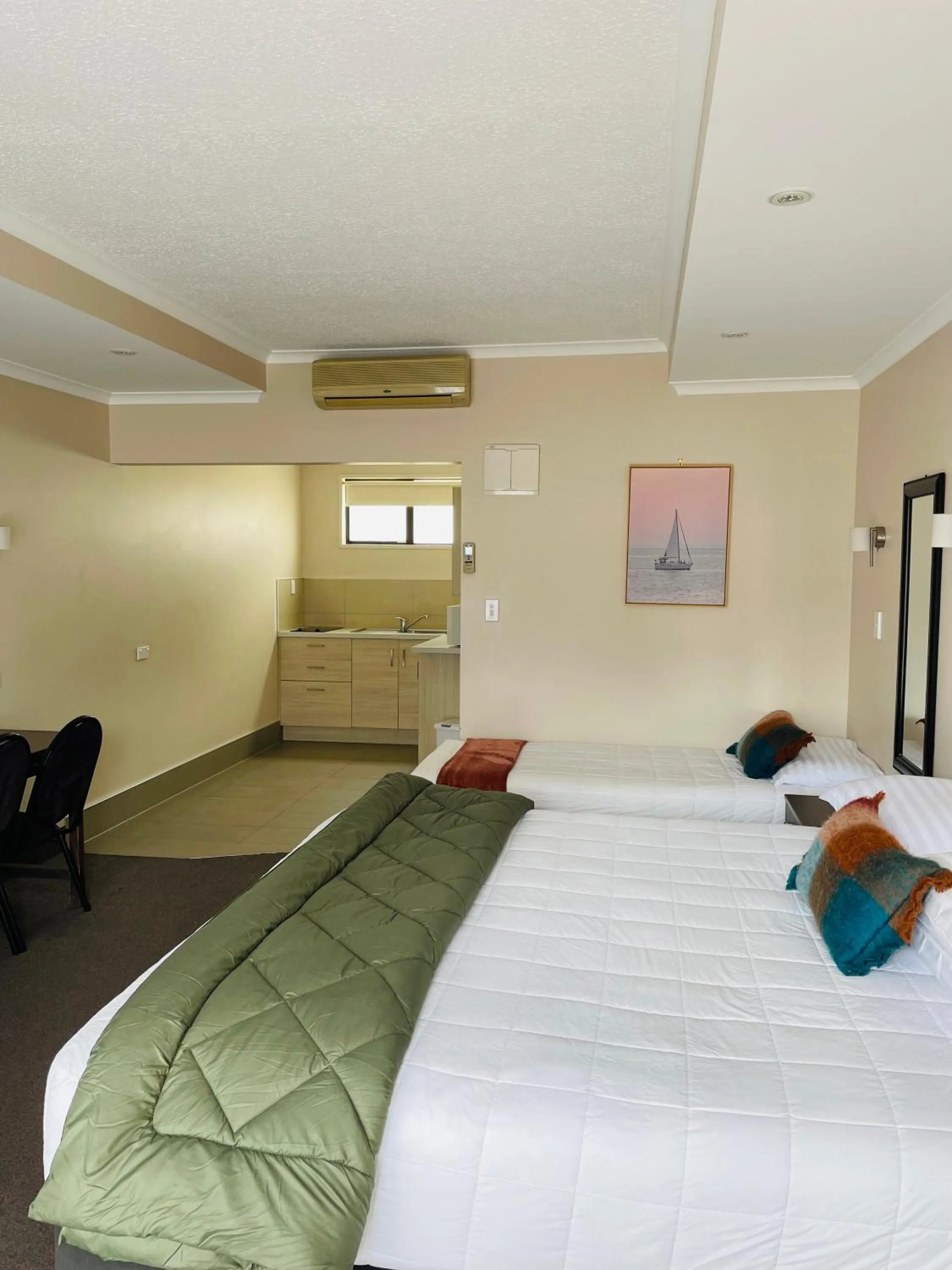 Bed in Kauri Court Motel and Apartments