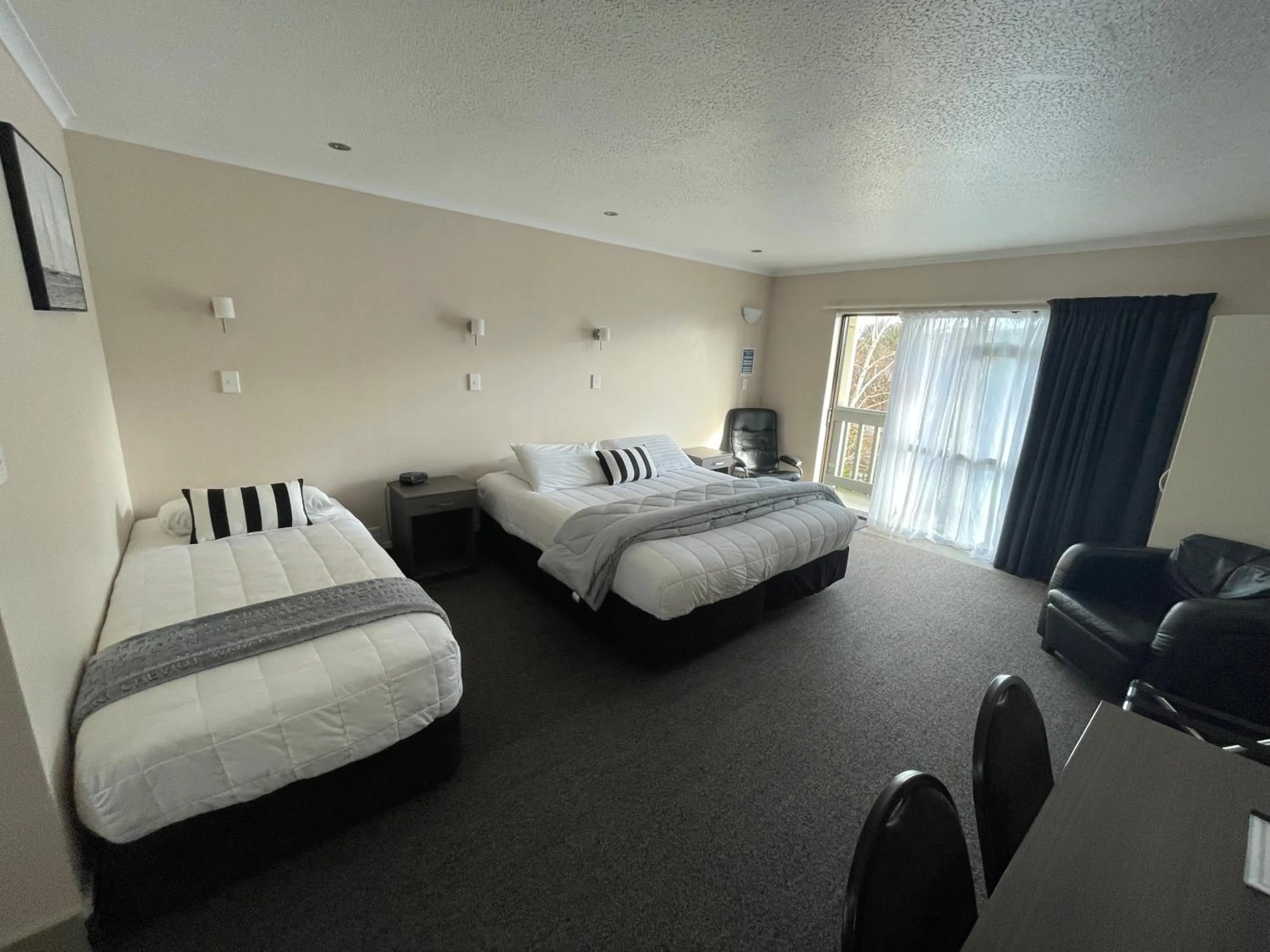 Bed in Kauri Court Motel and Apartments