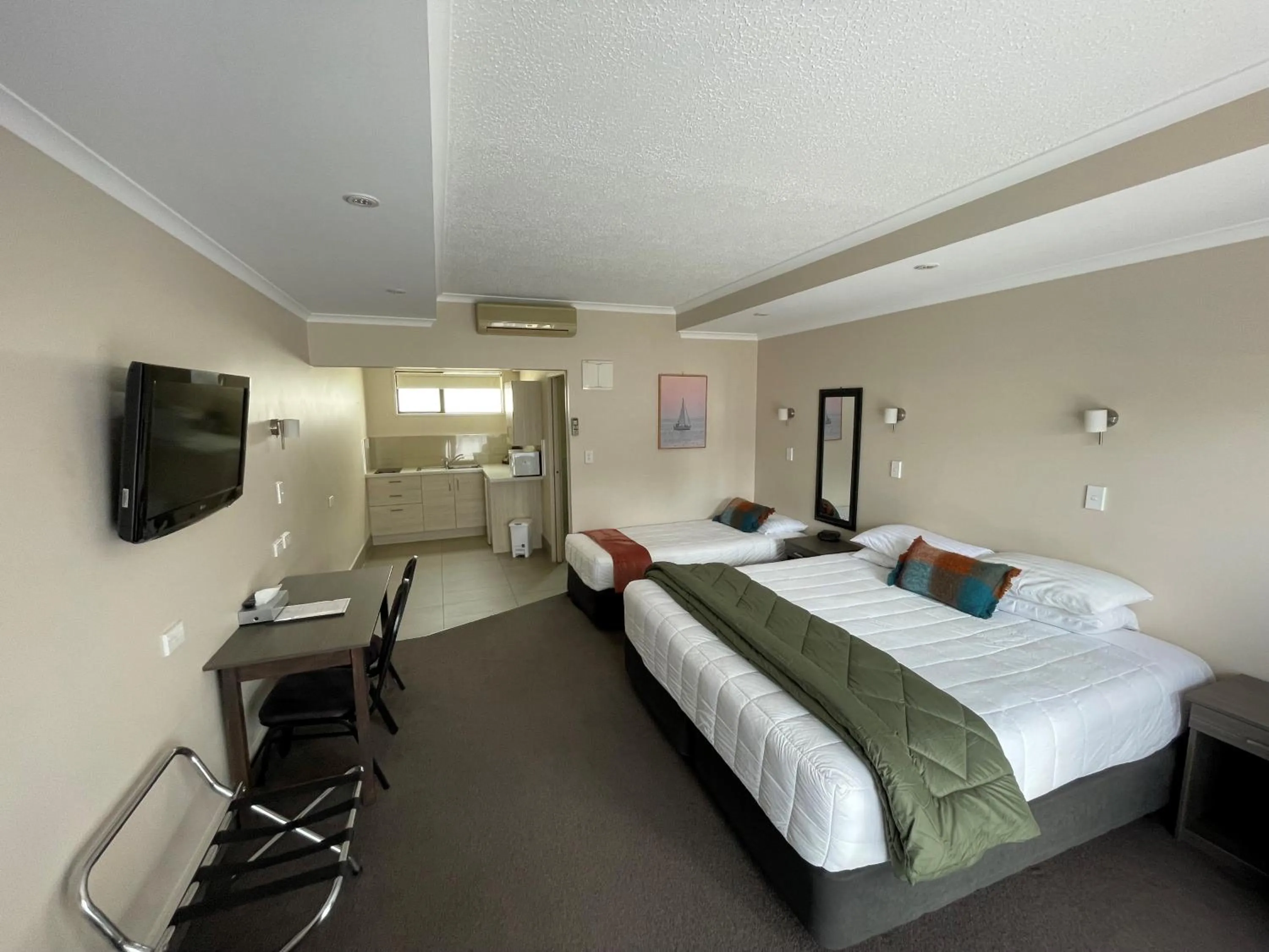 Bed in Kauri Court Motel and Apartments