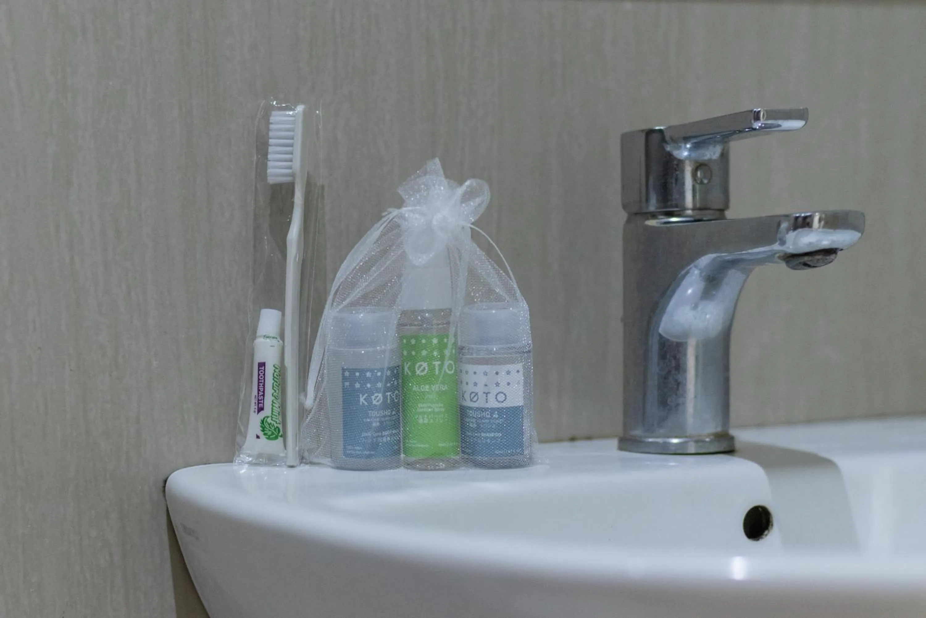 Bathroom in Sans Hotel Kupang Indah Surabaya