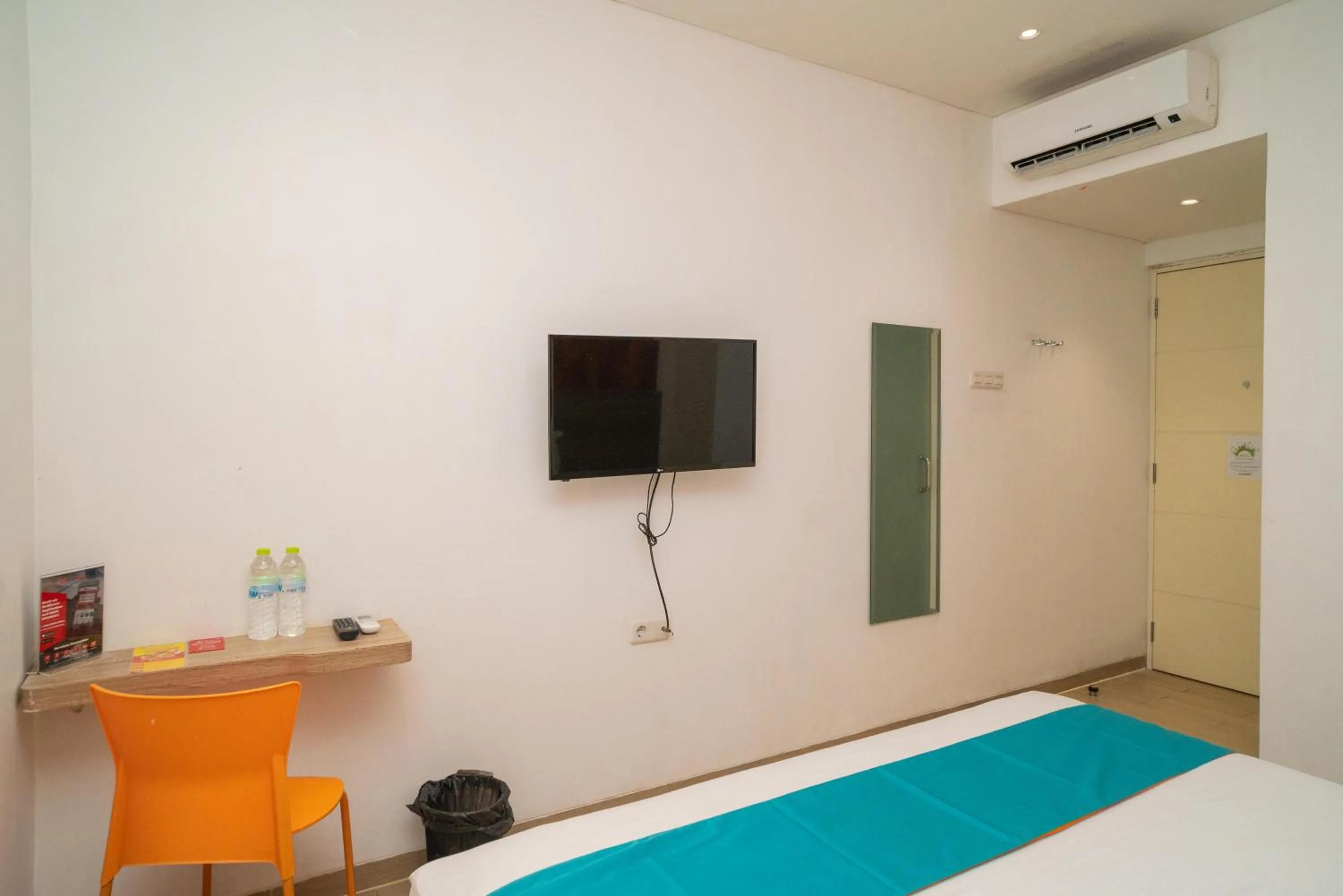 Bedroom, Bed in Sans Hotel Kupang Indah Surabaya