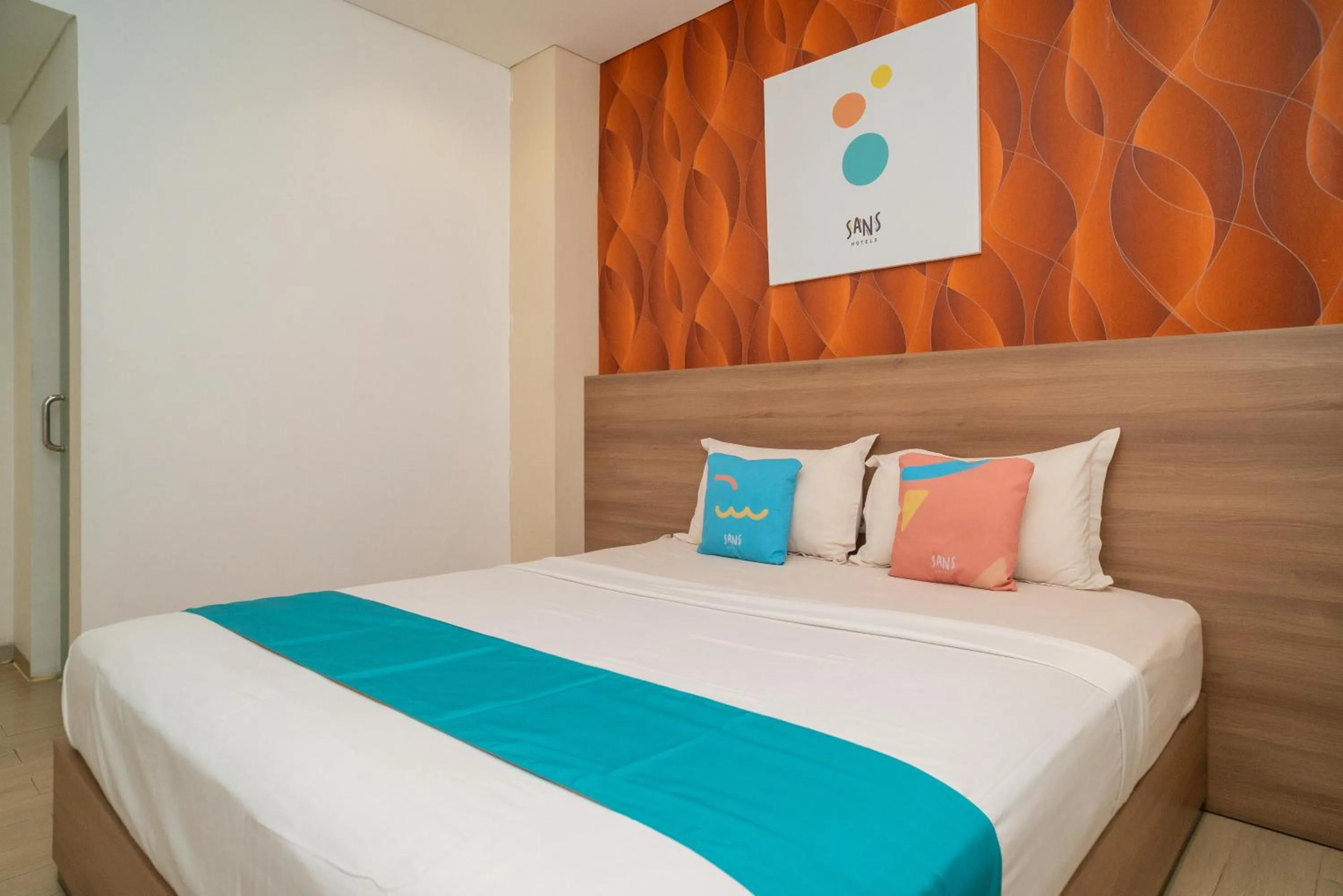 Bedroom, Bed in Sans Hotel Kupang Indah Surabaya