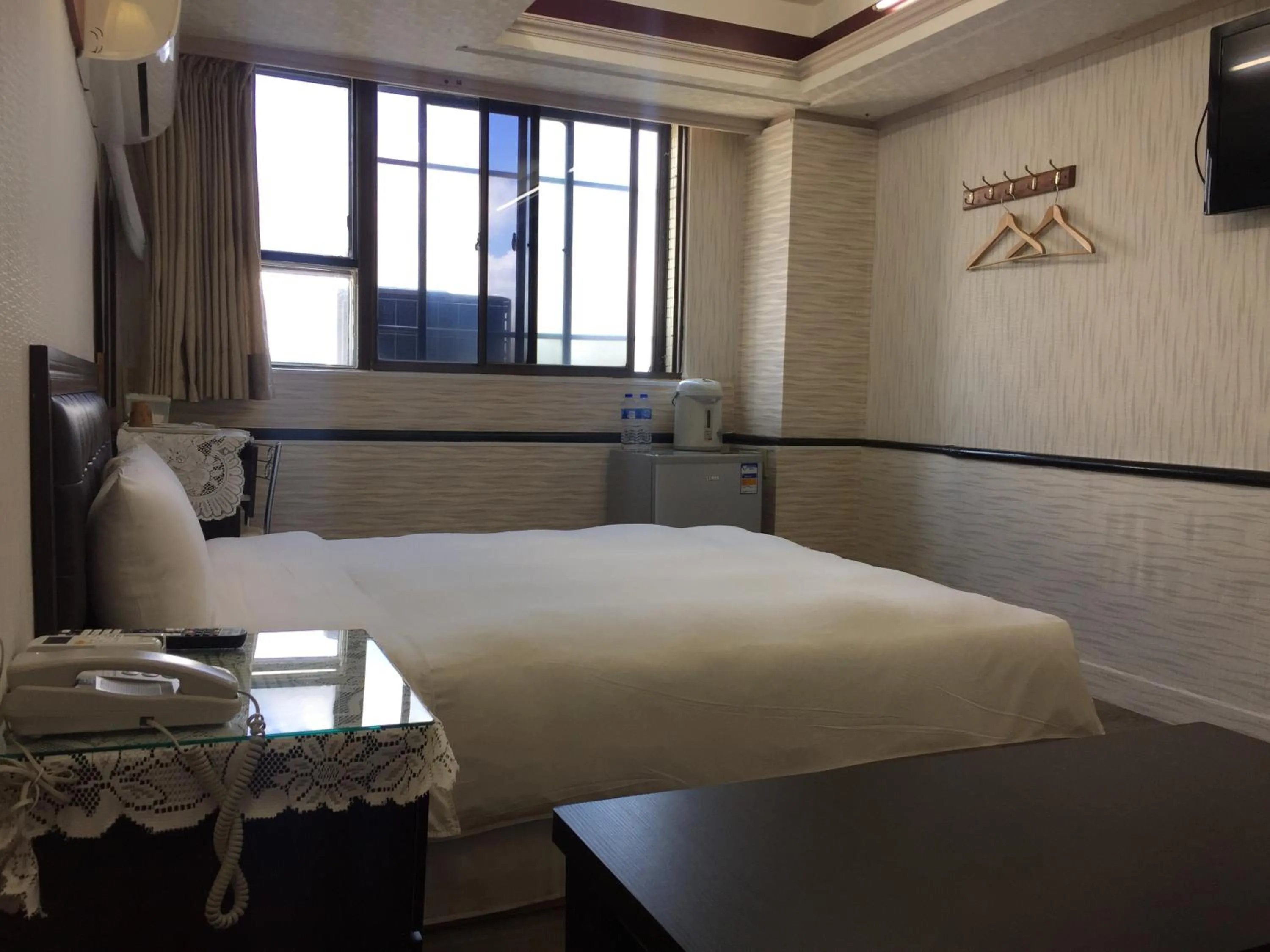 Bed in King Lo Tung Hotel