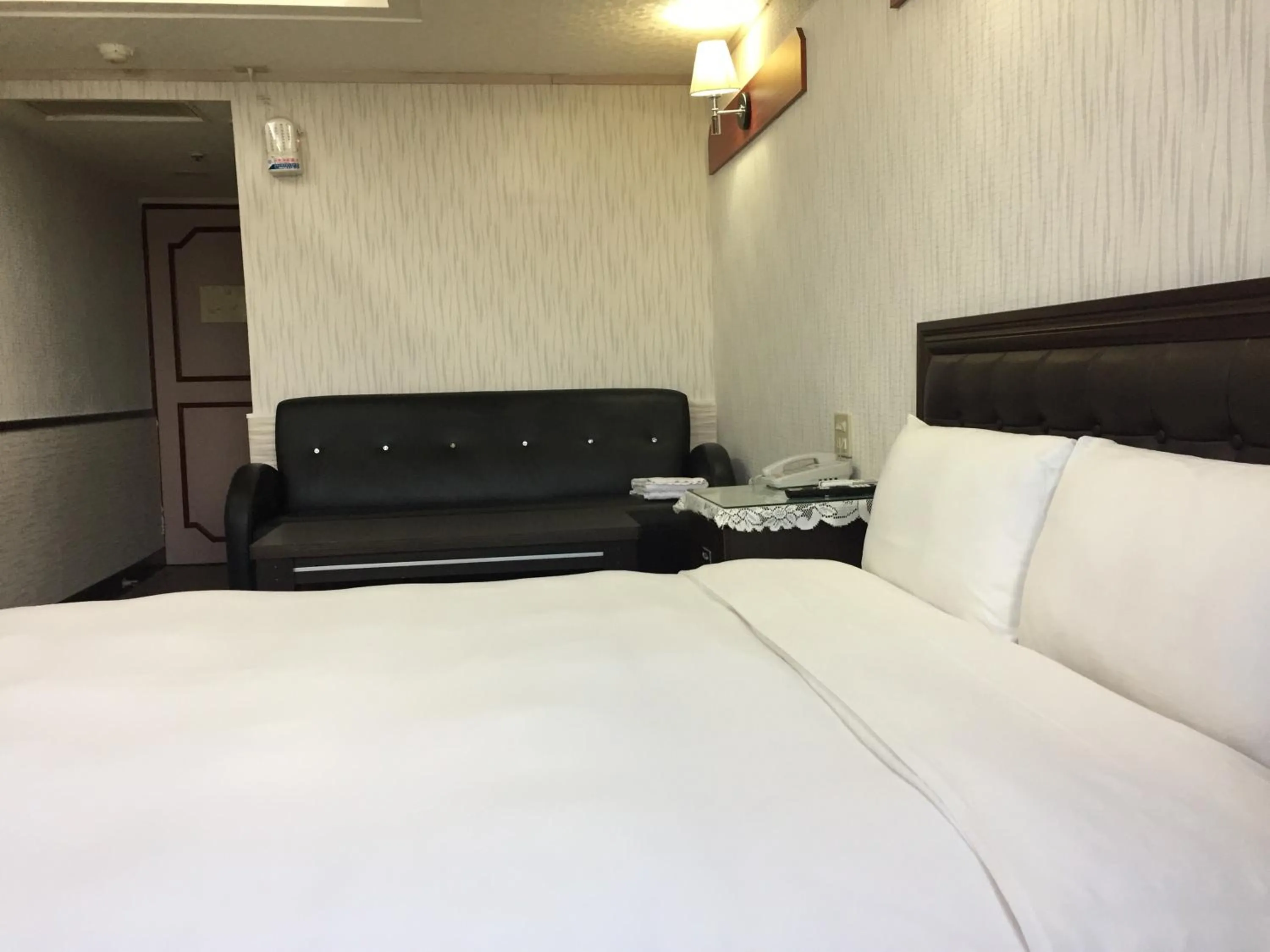 Bed in King Lo Tung Hotel
