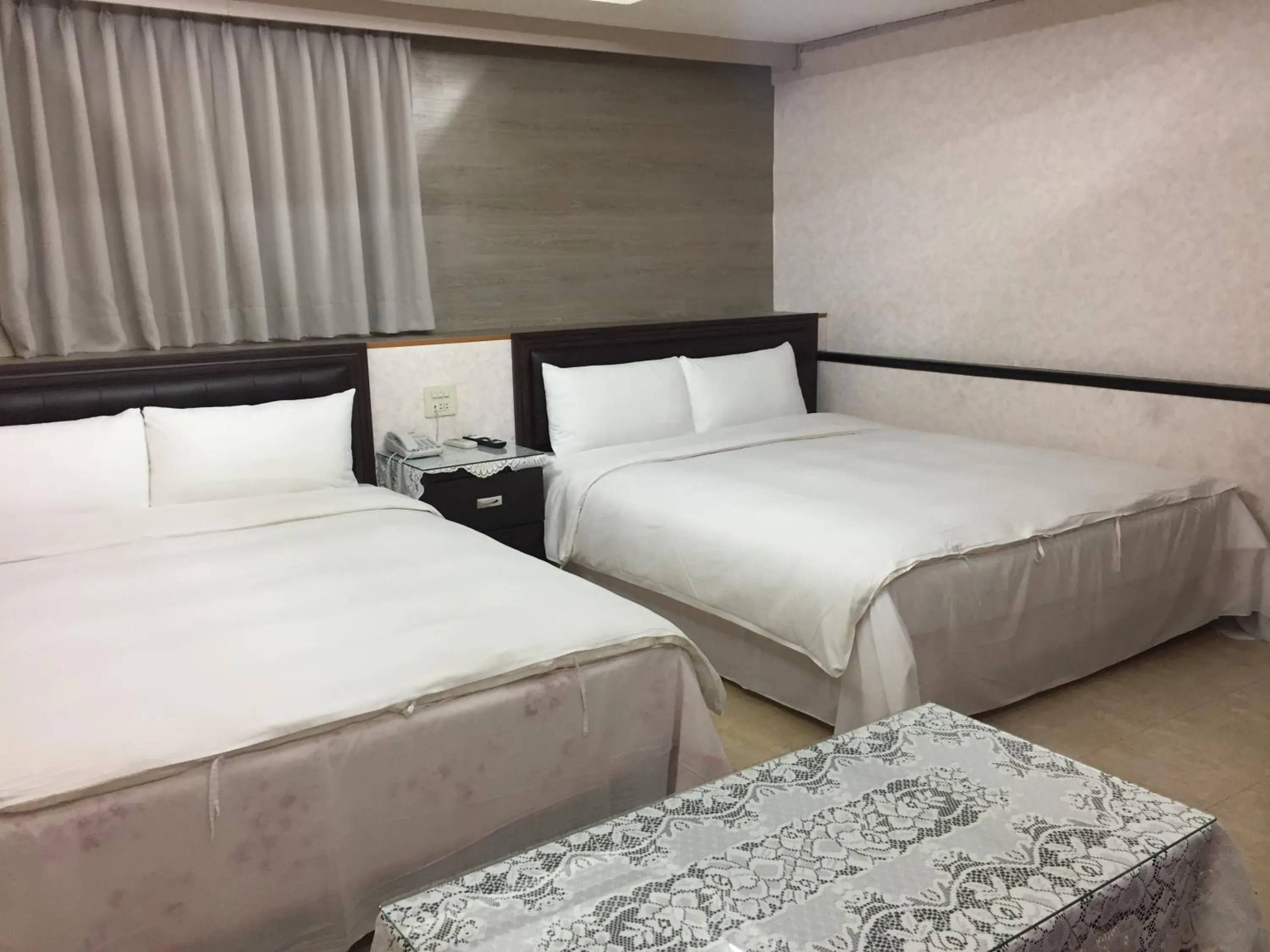 Bed in King Lo Tung Hotel