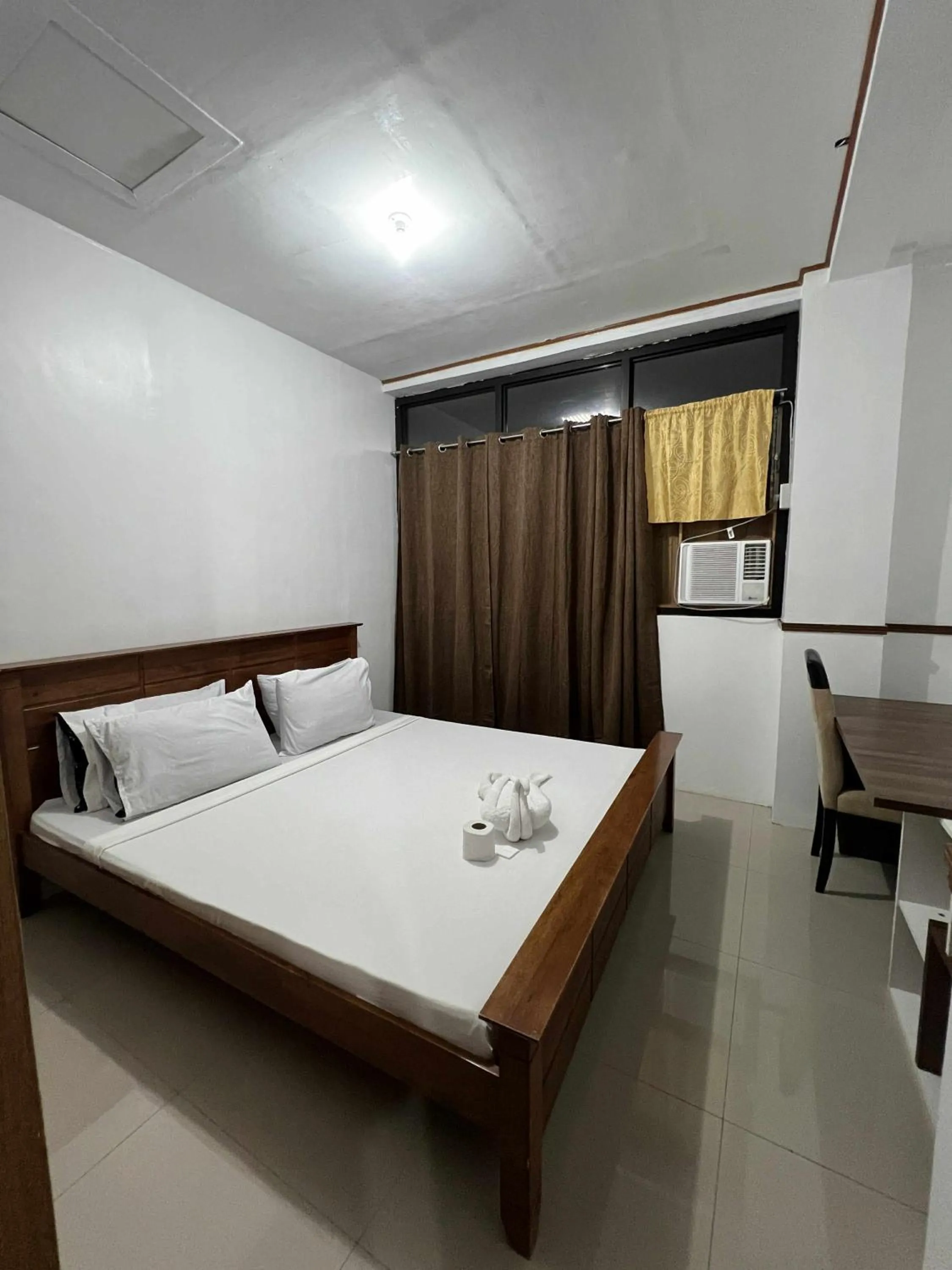 Bed in Axis Pension Hotel