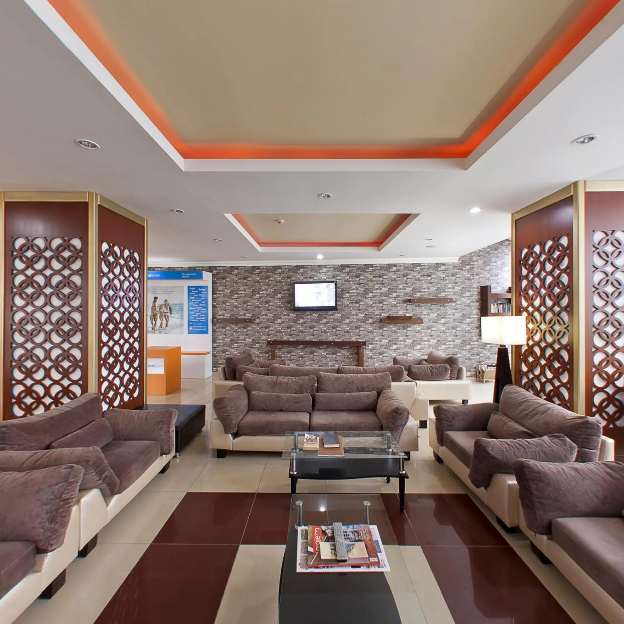 Communal lounge/ TV room in Lims Bona Dea Beach Hotel