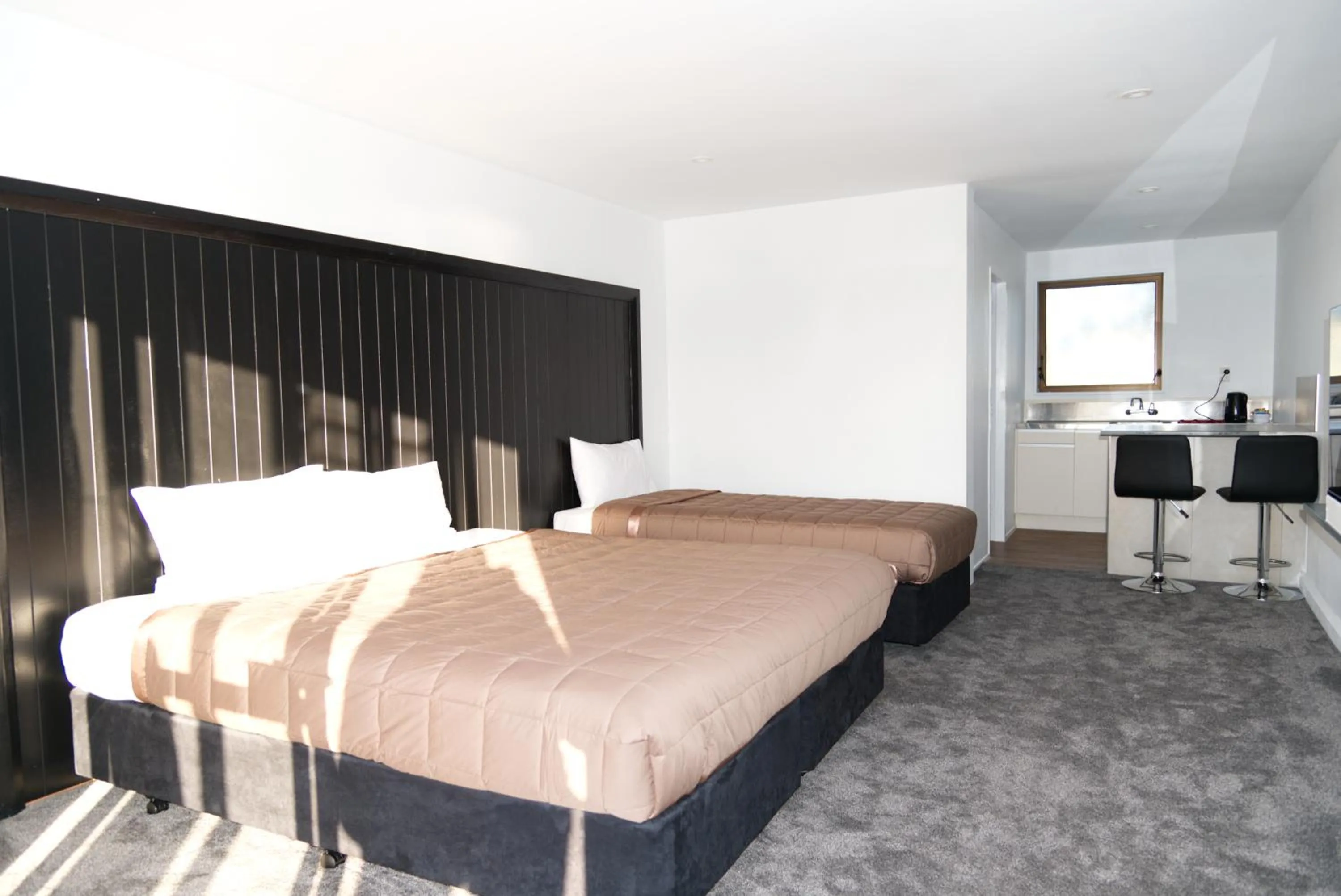 Bed in Aotea Lodge Porirua