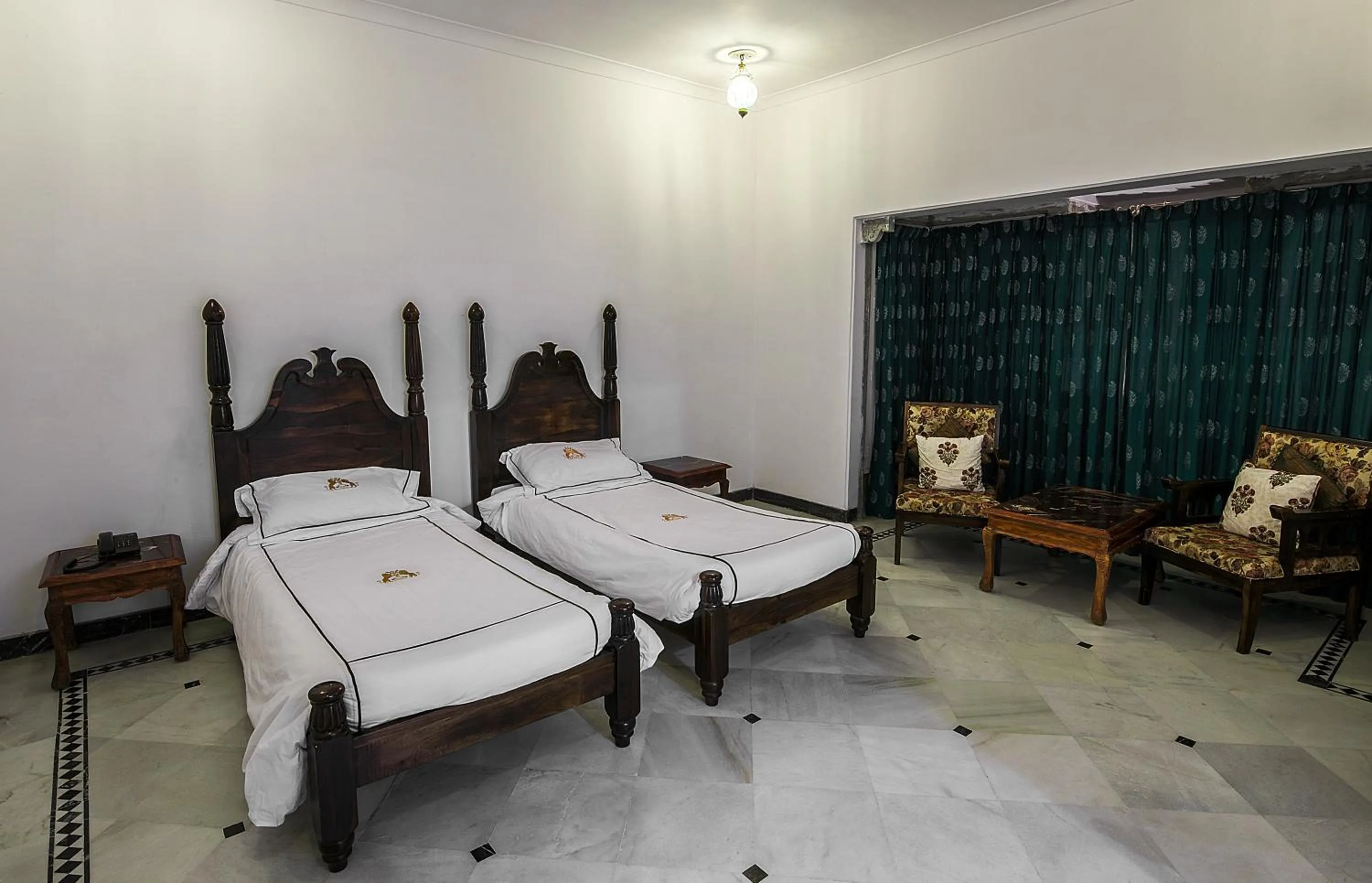 Bed in Shahpura Kumbhal Villas