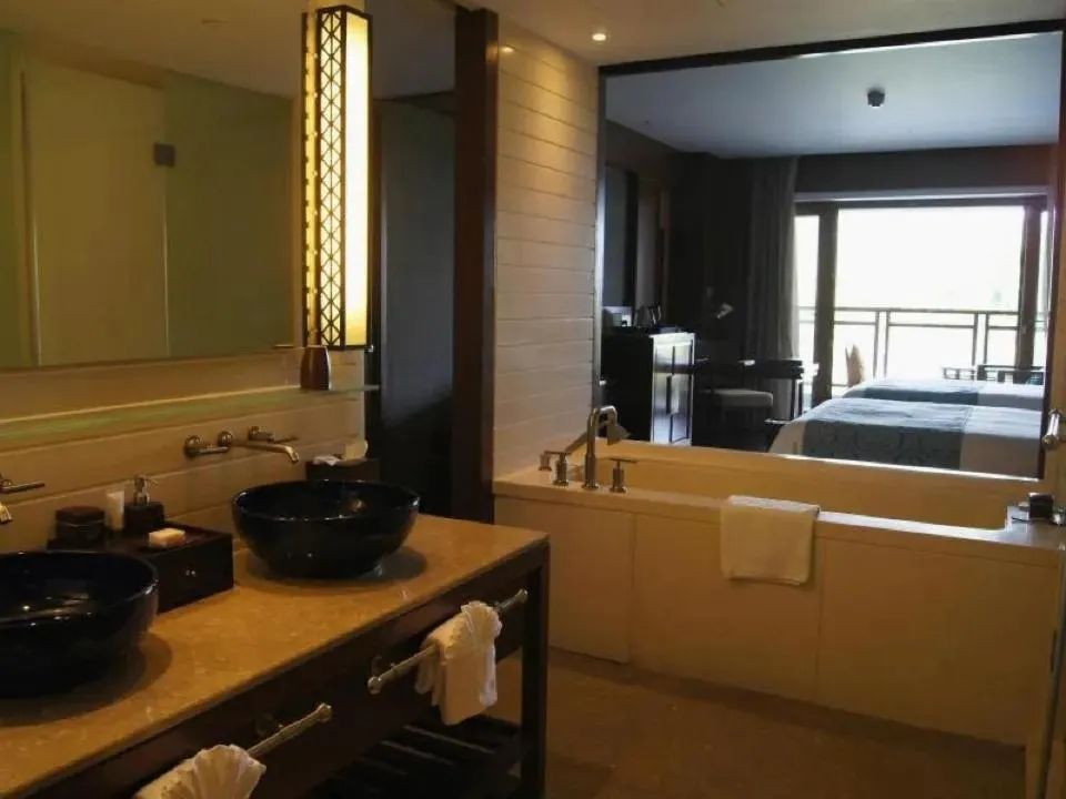 Toilet, Bed in Sanya LUHUITOU Resort & Spa