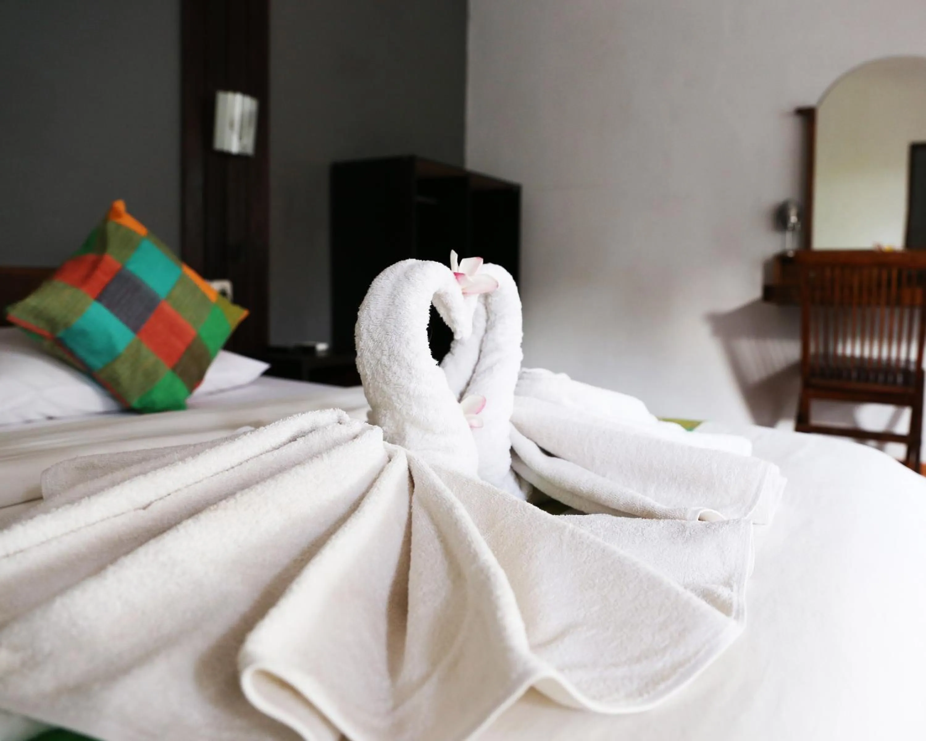 Bed in Kuri Garden Cottage