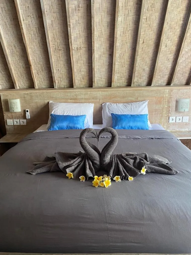 Bed in Kuri Garden Cottage