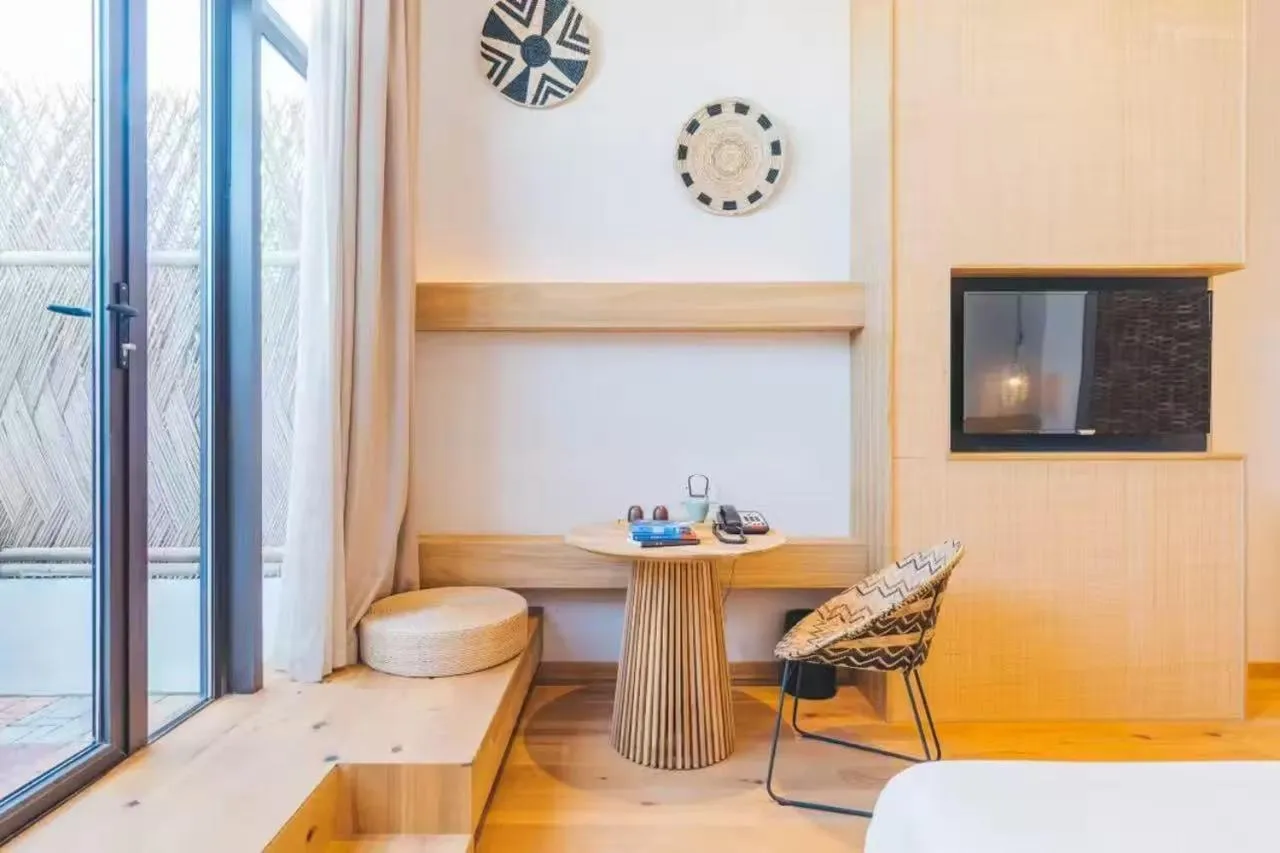 Bed in Manli Hotel Shanghai Pudong Airport Branch -Provide free shuttle buses to Pudong Airport and Disneyland