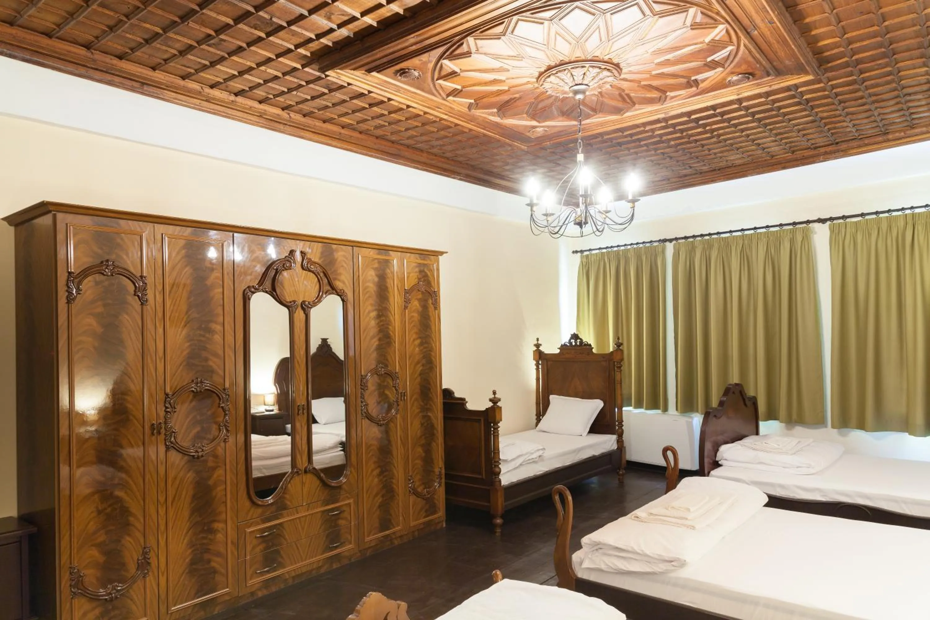 Bed in HiStory INN Unique Guest House