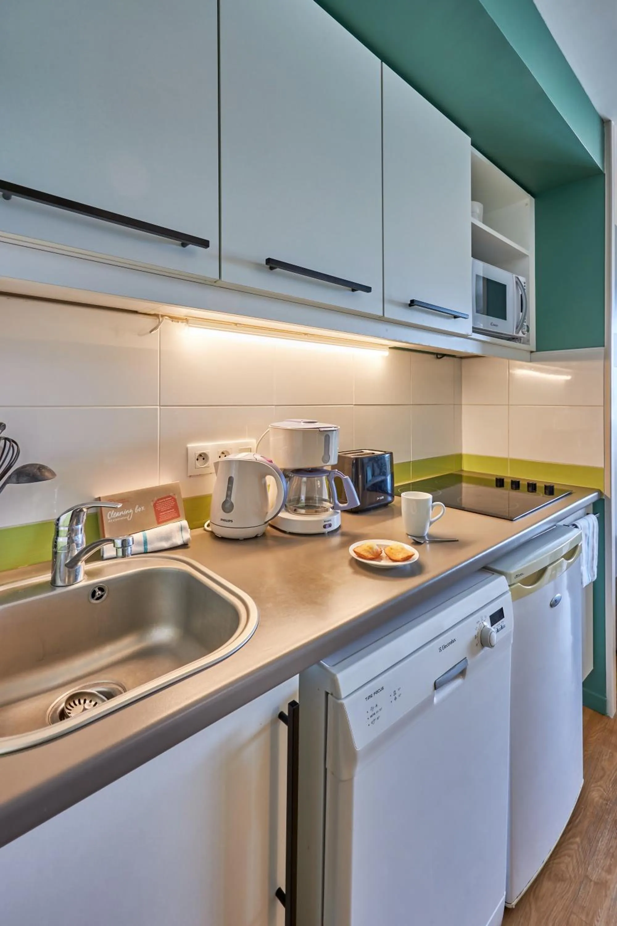 Kitchen or kitchenette in Pierre & Vacances Résidence Le Chant des Oiseaux