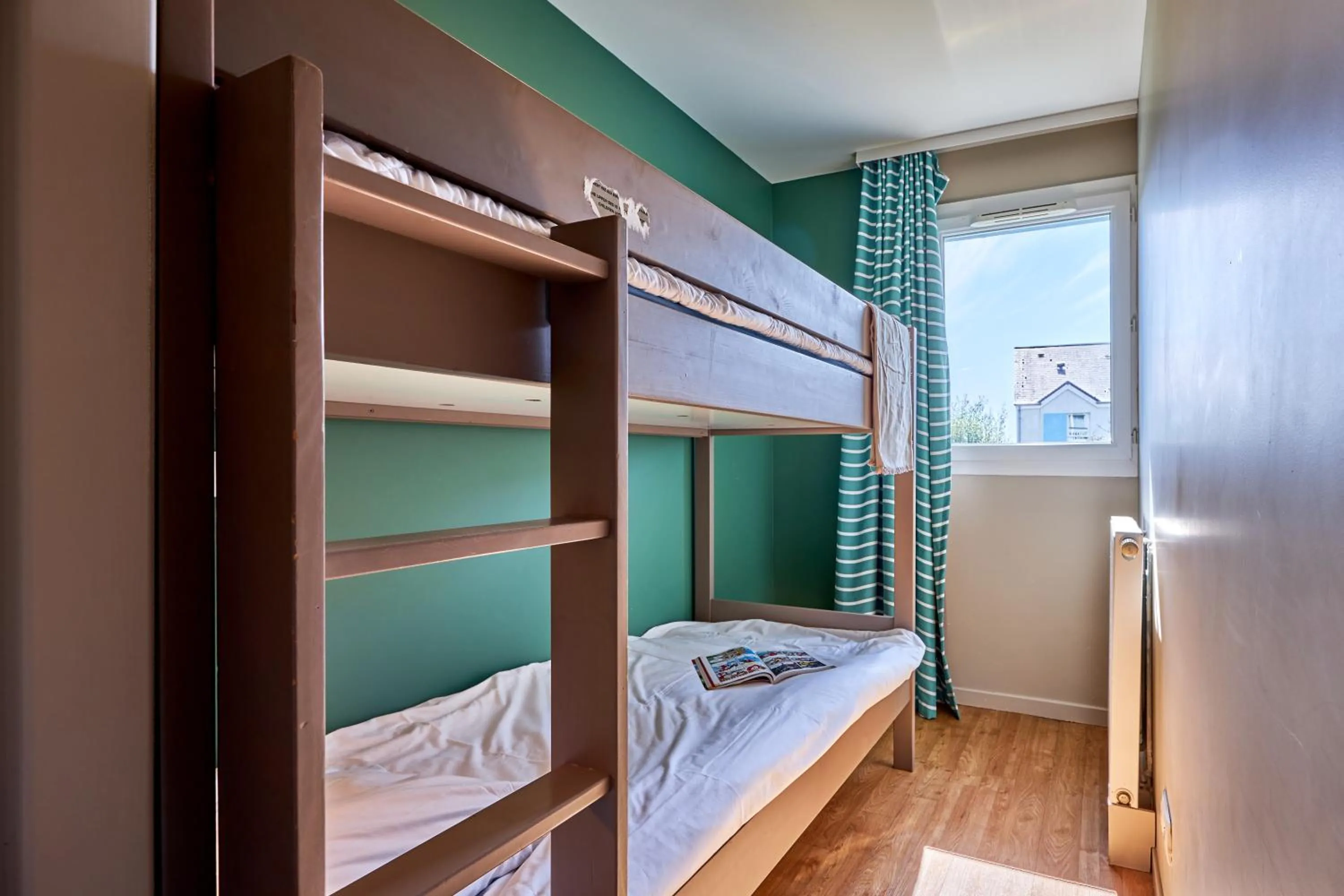 Bed in Pierre & Vacances Résidence Le Chant des Oiseaux