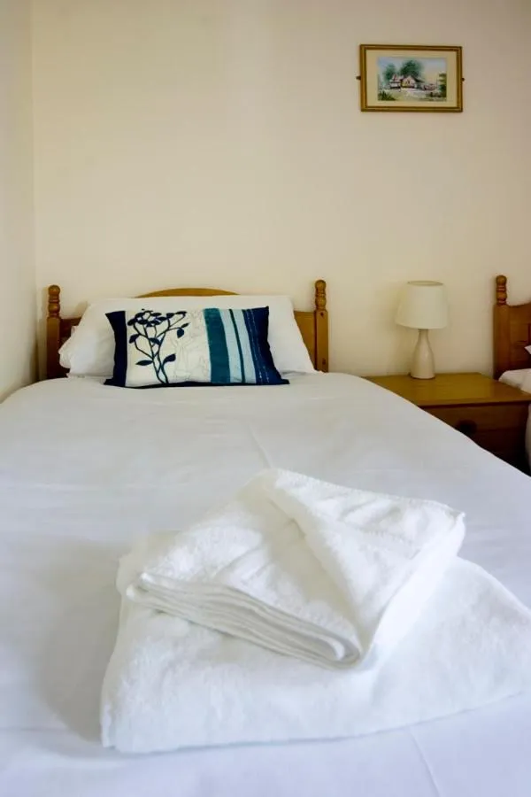 Bed in Green Haven Guest House