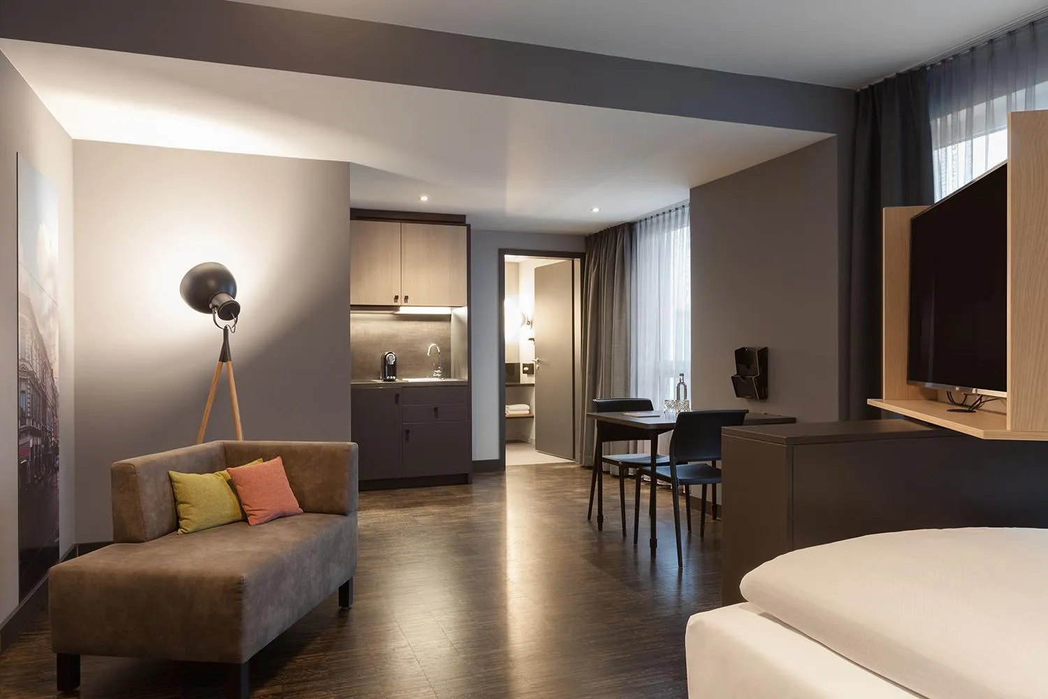 Living room in Vienna House Easy by Wyndham Bremen City Apartments