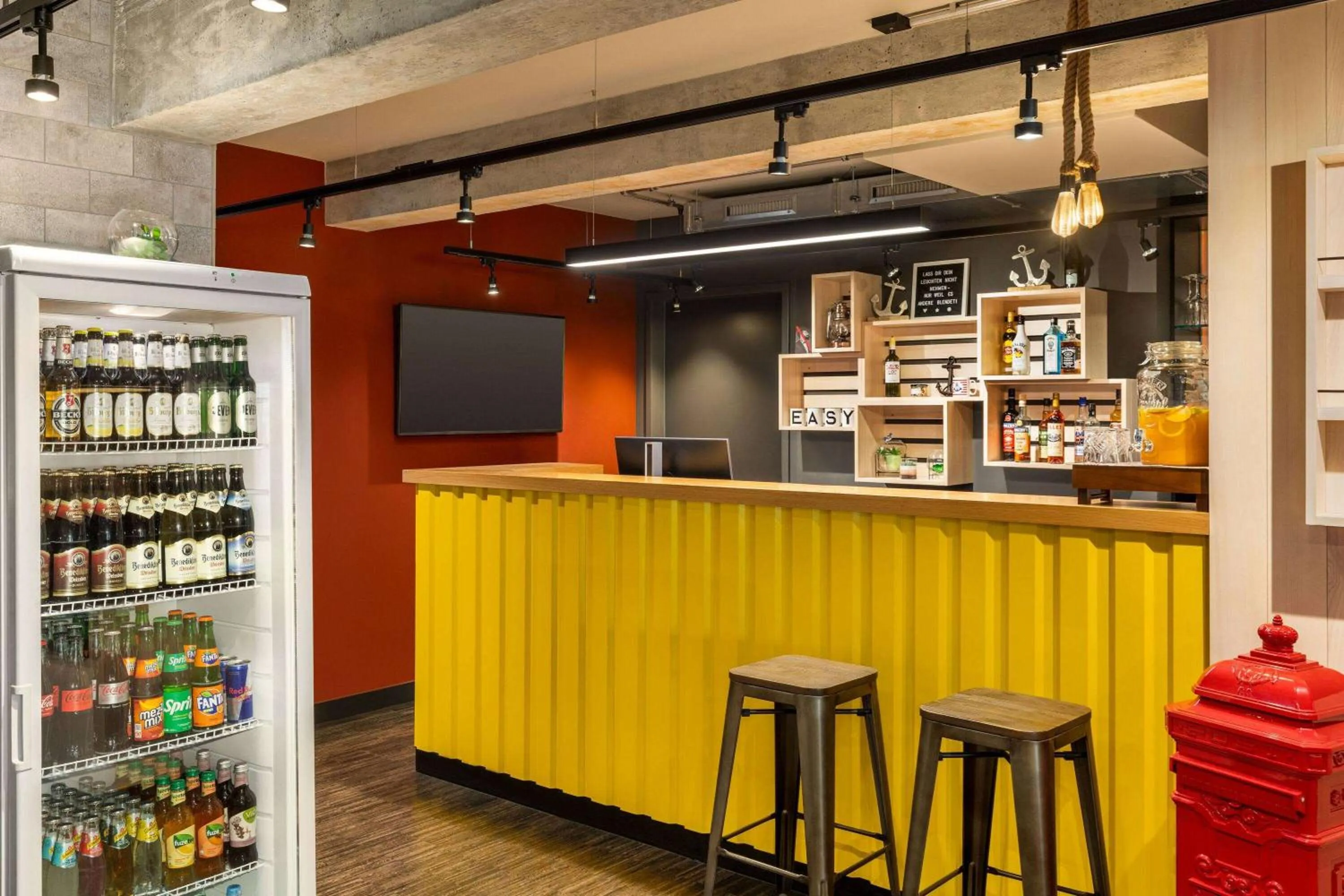 Lobby or reception in Vienna House Easy by Wyndham Bremen City Apartments